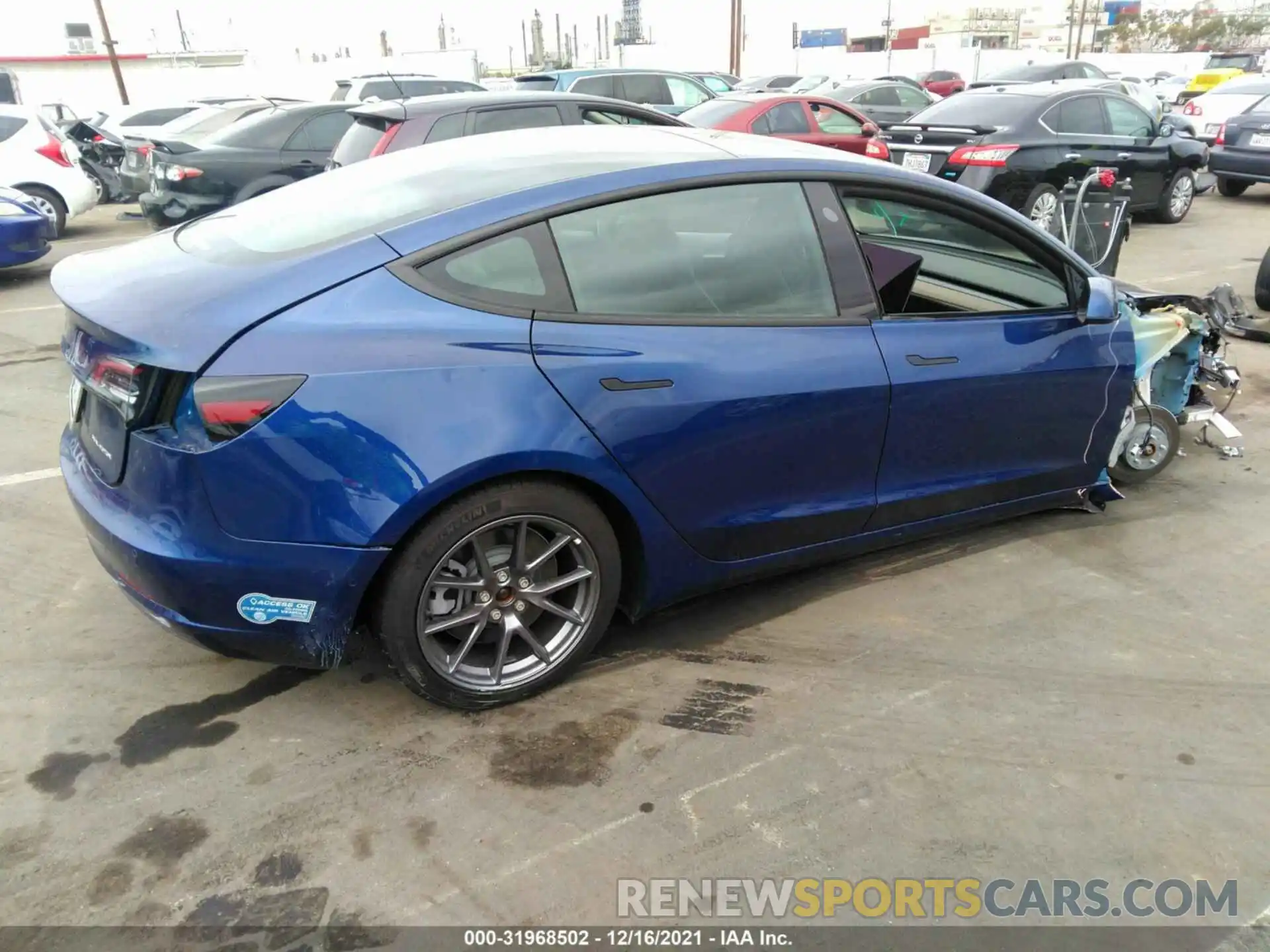 4 Photograph of a damaged car 5YJ3E1EBXMF003610 TESLA MODEL 3 2021