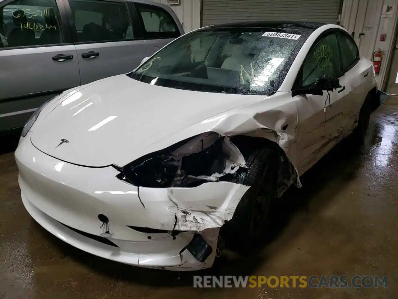 2 Photograph of a damaged car 5YJ3E1EBXMF013313 TESLA MODEL 3 2021