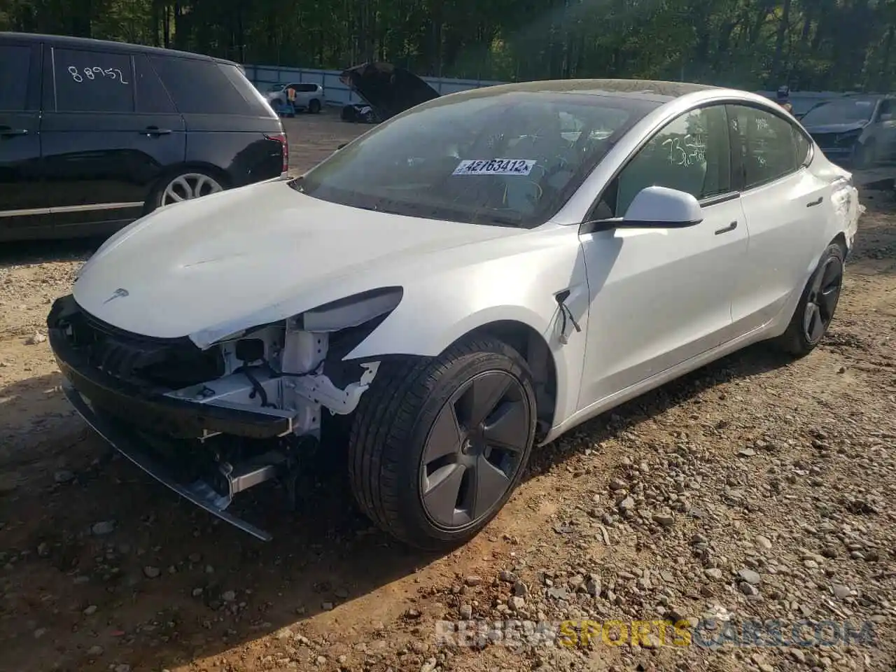 2 Photograph of a damaged car 5YJ3E1EBXMF052046 TESLA MODEL 3 2021