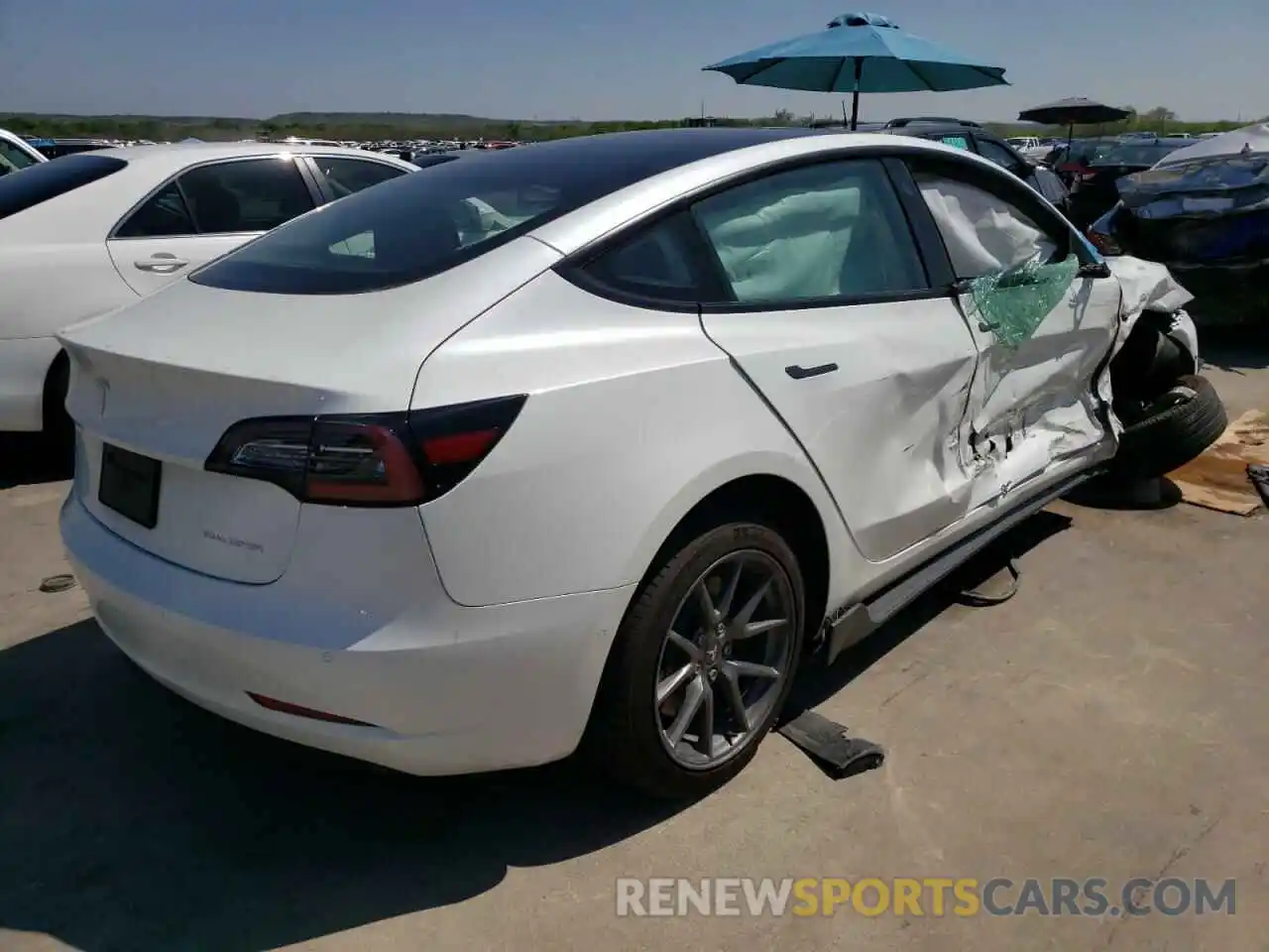 4 Photograph of a damaged car 5YJ3E1EBXMF067954 TESLA MODEL 3 2021