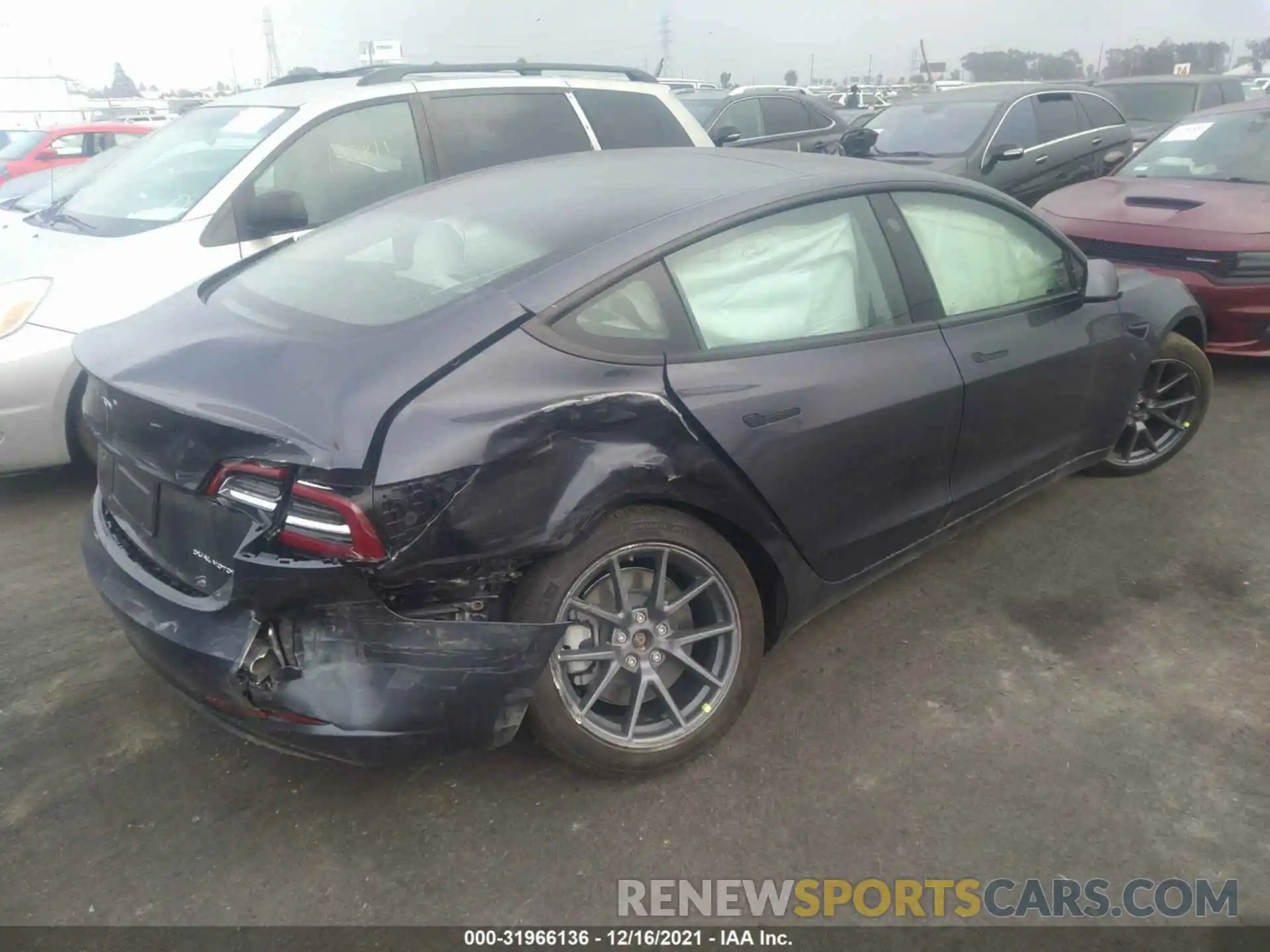 4 Photograph of a damaged car 5YJ3E1EBXMF074483 TESLA MODEL 3 2021