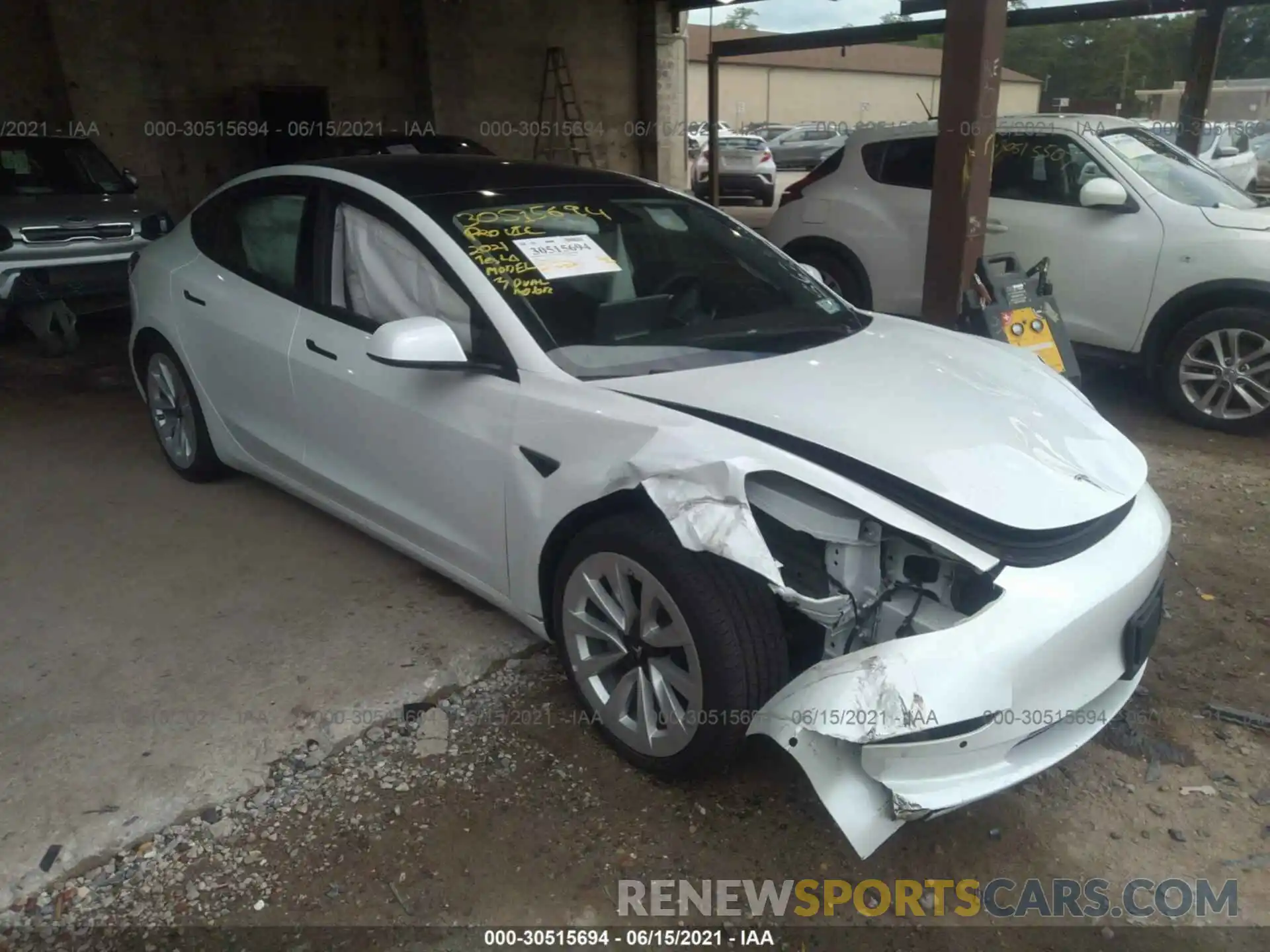 1 Photograph of a damaged car 5YJ3E1EBXMF862356 TESLA MODEL 3 2021