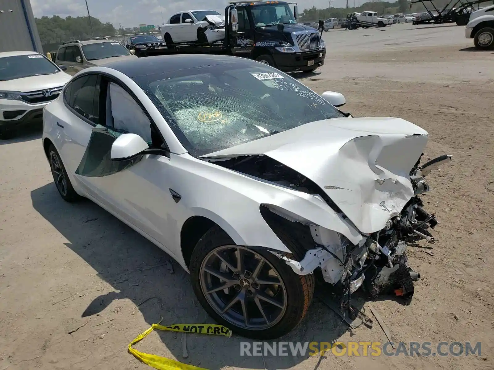 1 Photograph of a damaged car 5YJ3E1EBXMF869596 TESLA MODEL 3 2021