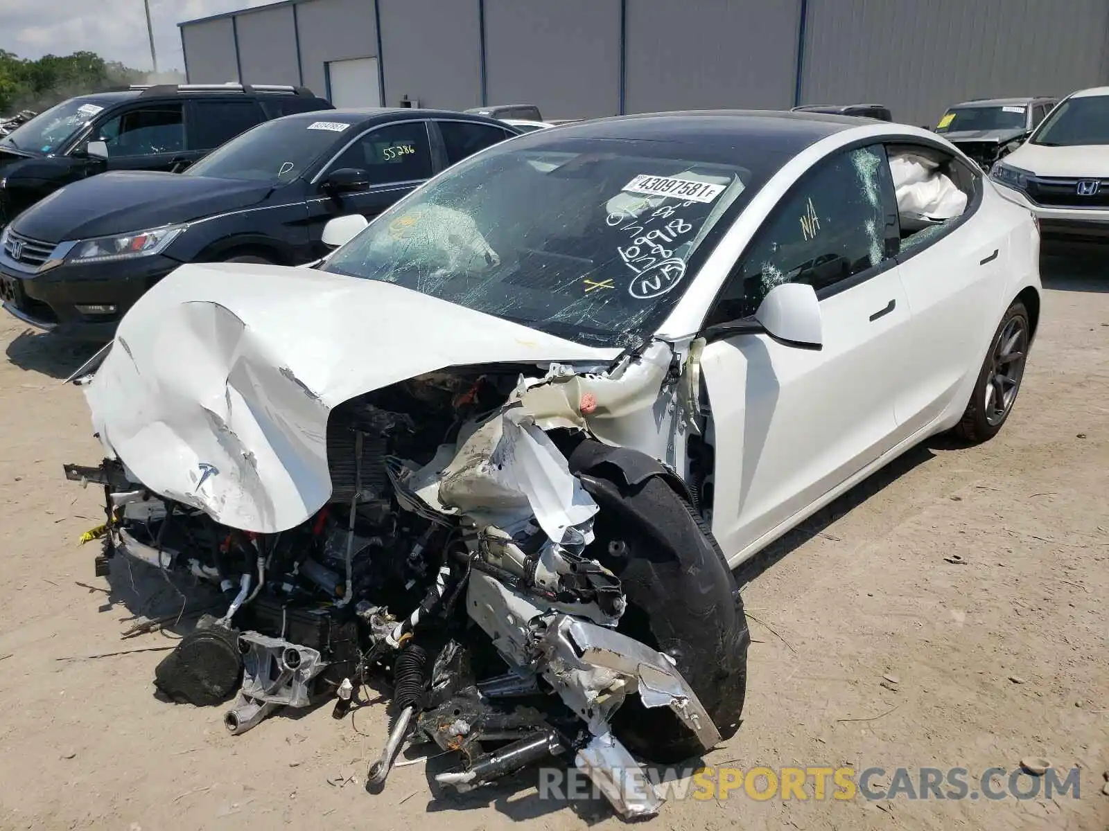 2 Photograph of a damaged car 5YJ3E1EBXMF869596 TESLA MODEL 3 2021