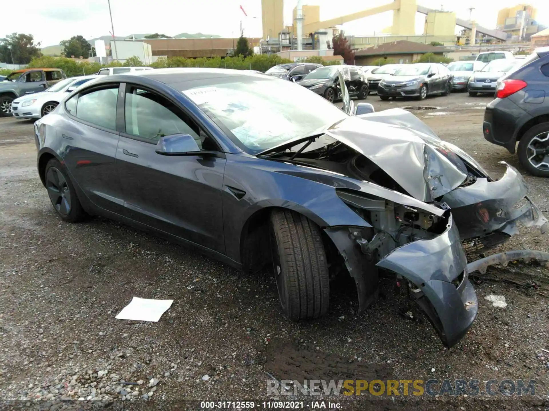 1 Photograph of a damaged car 5YJ3E1EBXMF874913 TESLA MODEL 3 2021