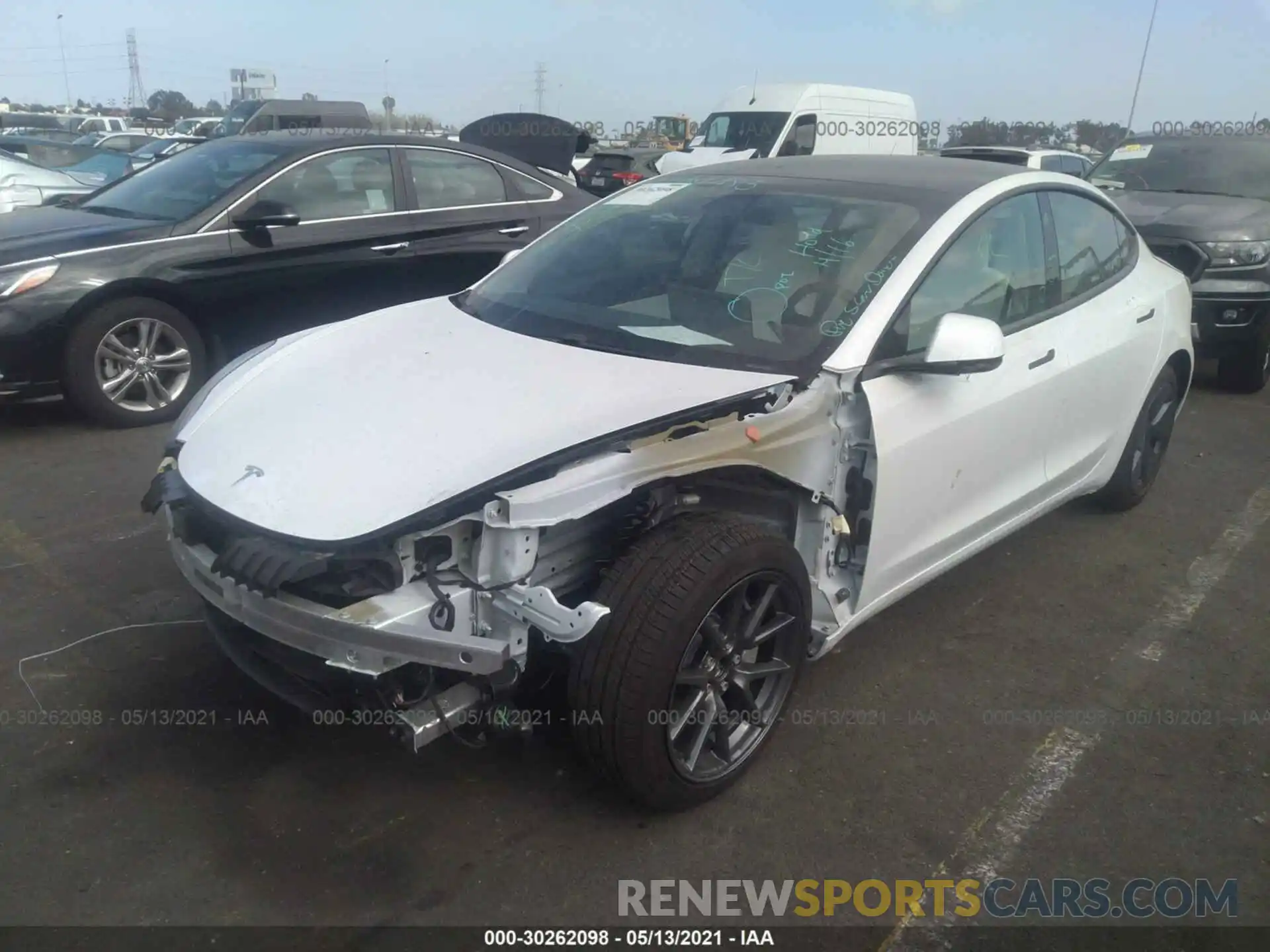 2 Photograph of a damaged car 5YJ3E1EBXMF876208 TESLA MODEL 3 2021