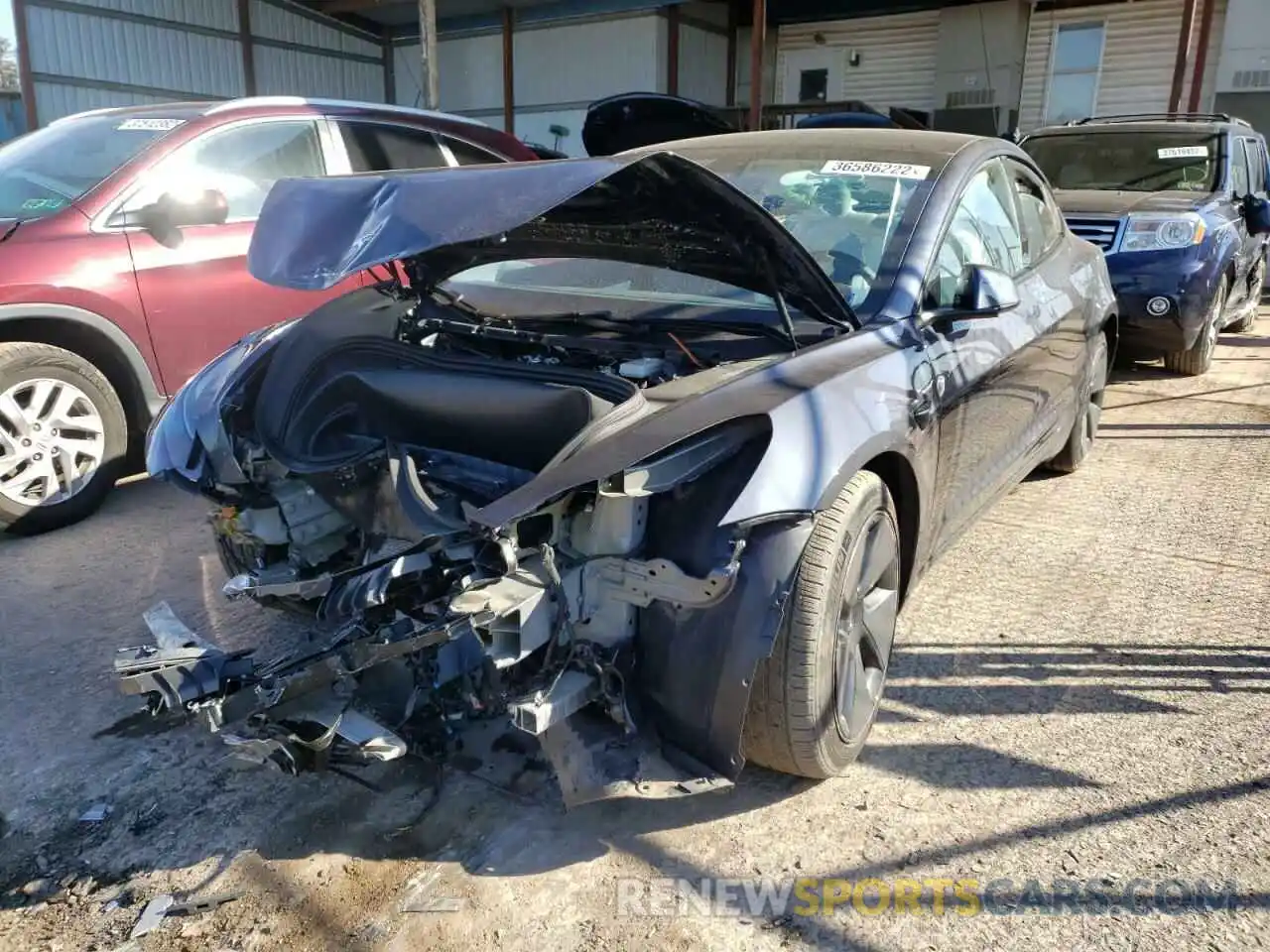 2 Photograph of a damaged car 5YJ3E1EBXMF903083 TESLA MODEL 3 2021