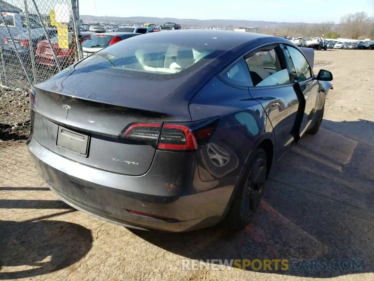 4 Photograph of a damaged car 5YJ3E1EBXMF903083 TESLA MODEL 3 2021