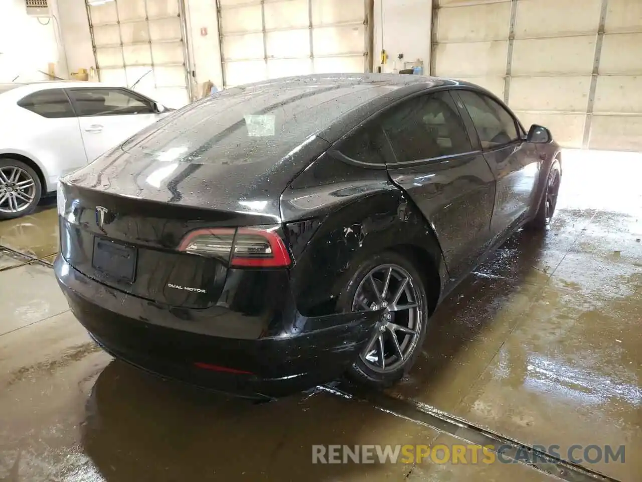 4 Photograph of a damaged car 5YJ3E1EBXMF924645 TESLA MODEL 3 2021