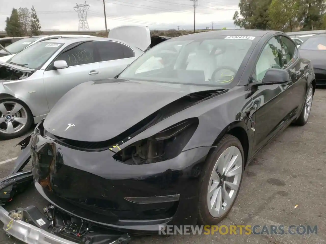 2 Photograph of a damaged car 5YJ3E1EBXMF936004 TESLA MODEL 3 2021