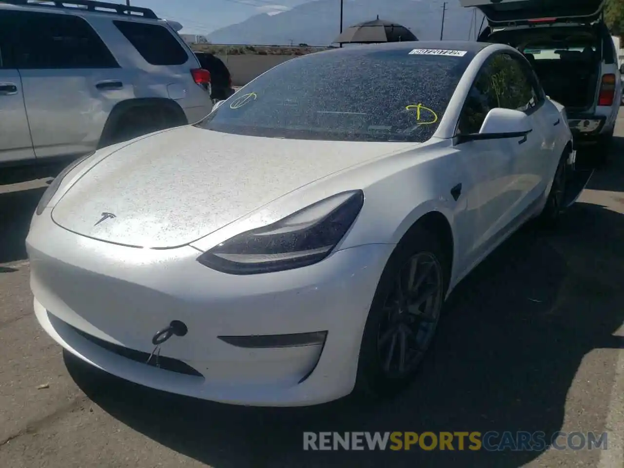 2 Photograph of a damaged car 5YJ3E1EBXMF939890 TESLA MODEL 3 2021