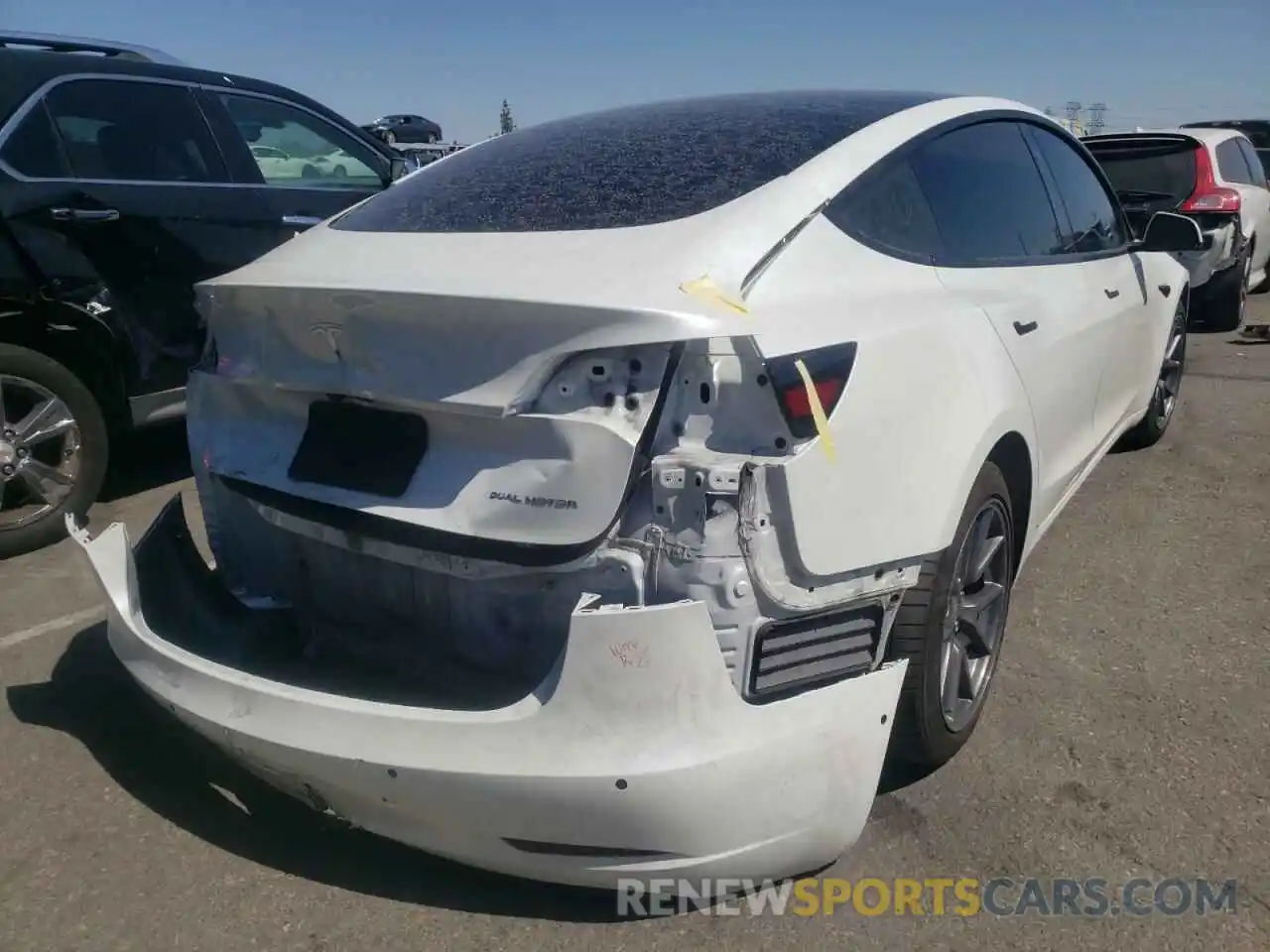 4 Photograph of a damaged car 5YJ3E1EBXMF939890 TESLA MODEL 3 2021