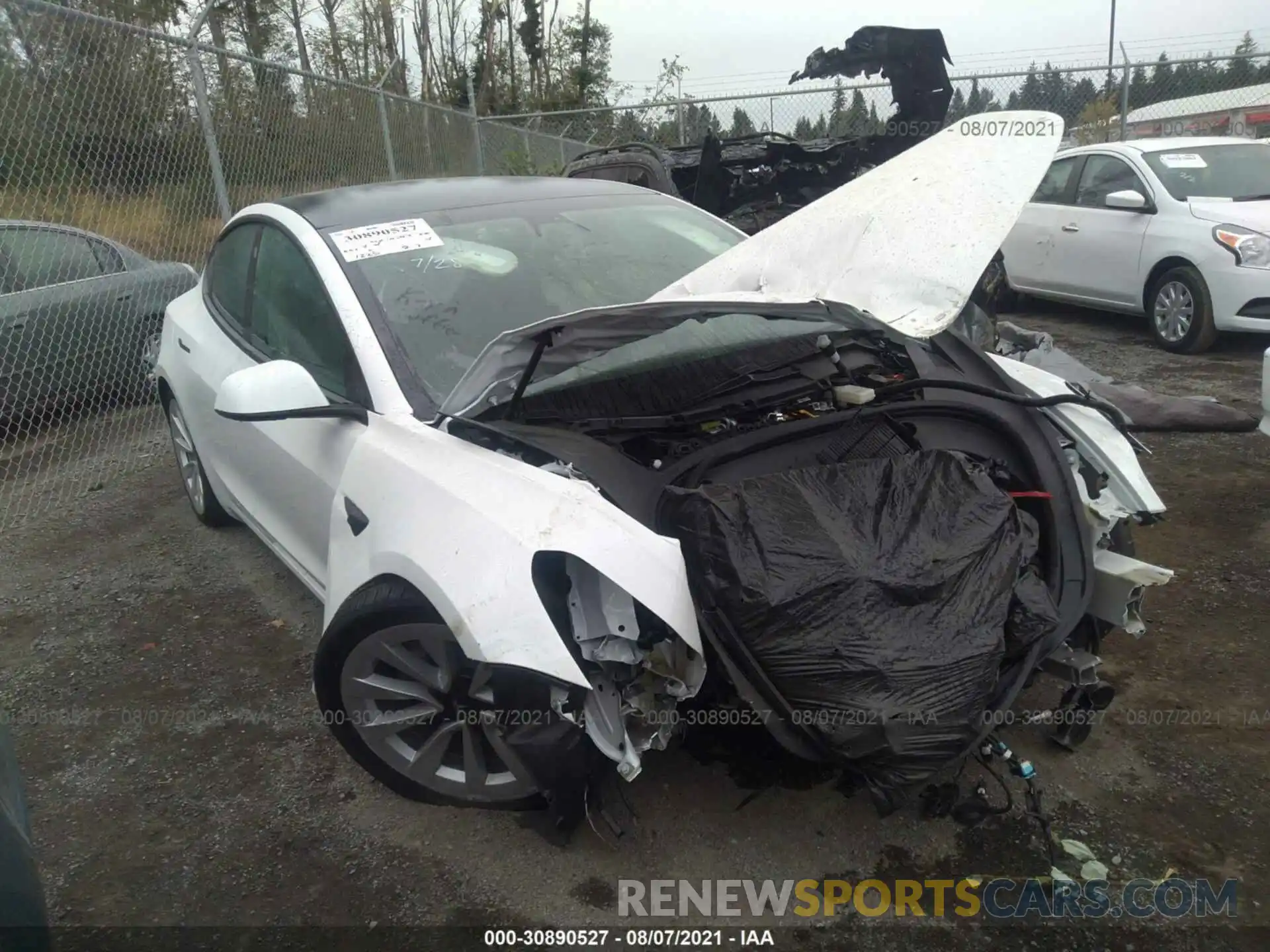 1 Photograph of a damaged car 5YJ3E1EBXMF975305 TESLA MODEL 3 2021