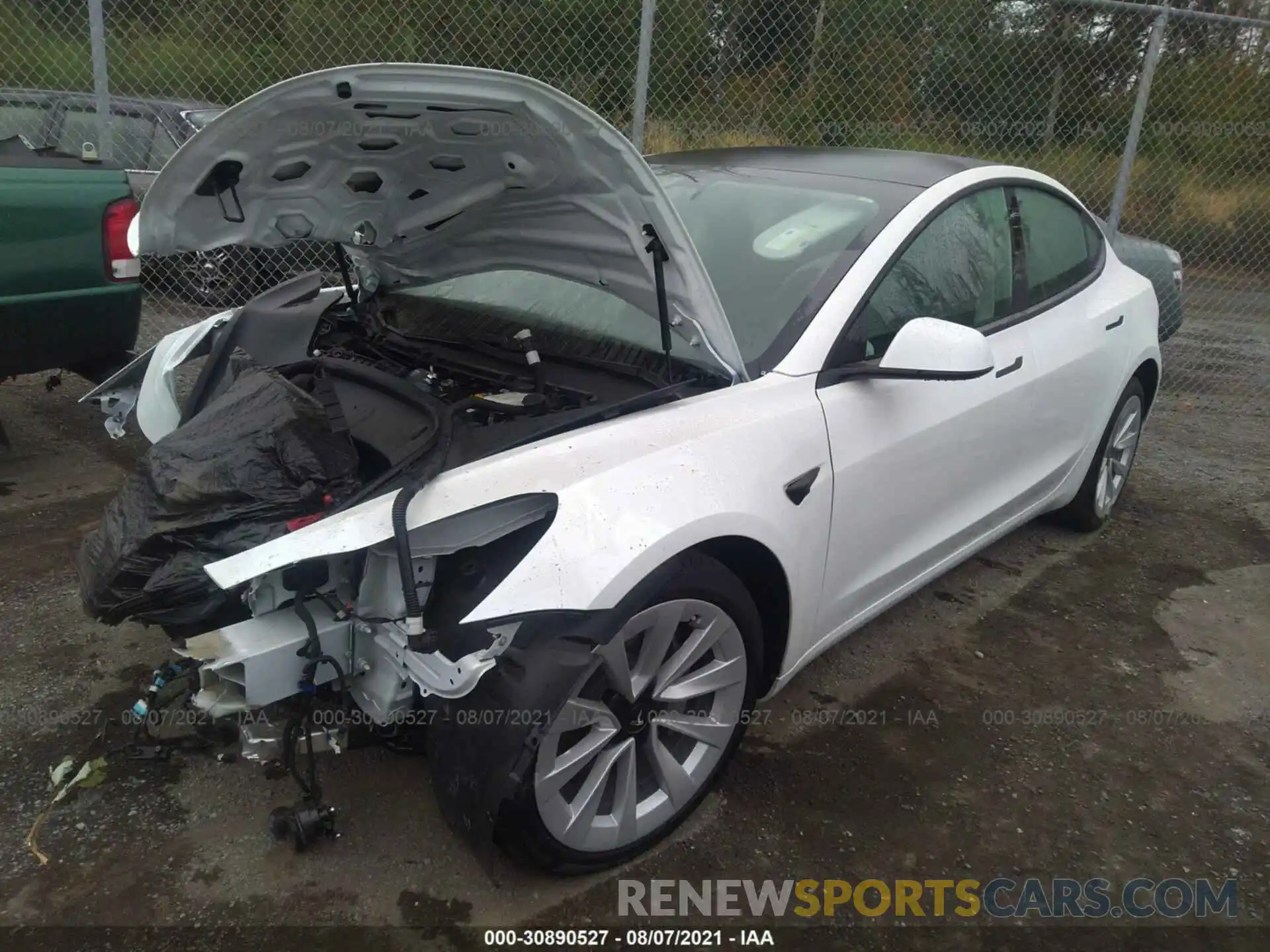 2 Photograph of a damaged car 5YJ3E1EBXMF975305 TESLA MODEL 3 2021