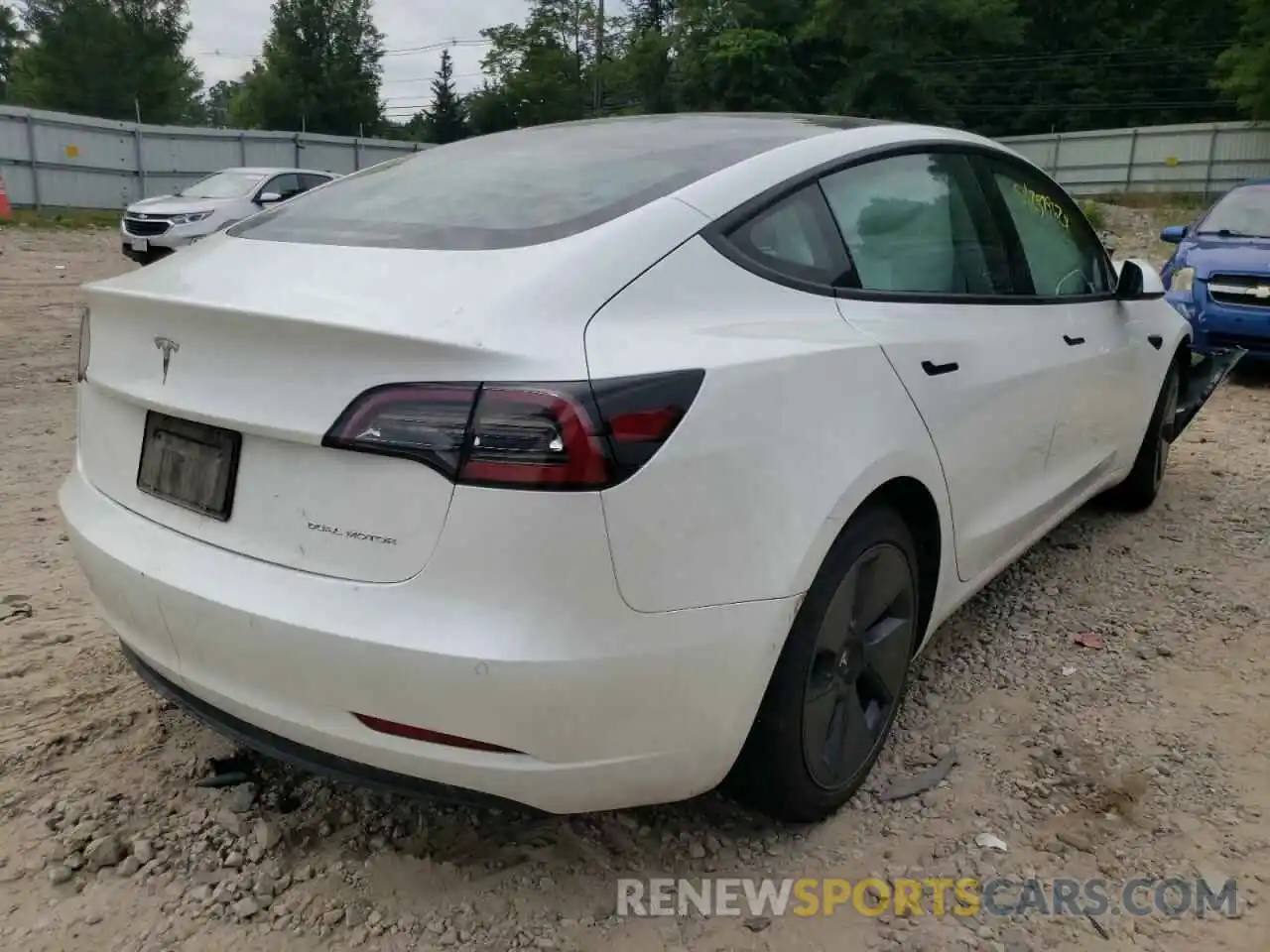 4 Photograph of a damaged car 5YJ3E1EBXMF978995 TESLA MODEL 3 2021