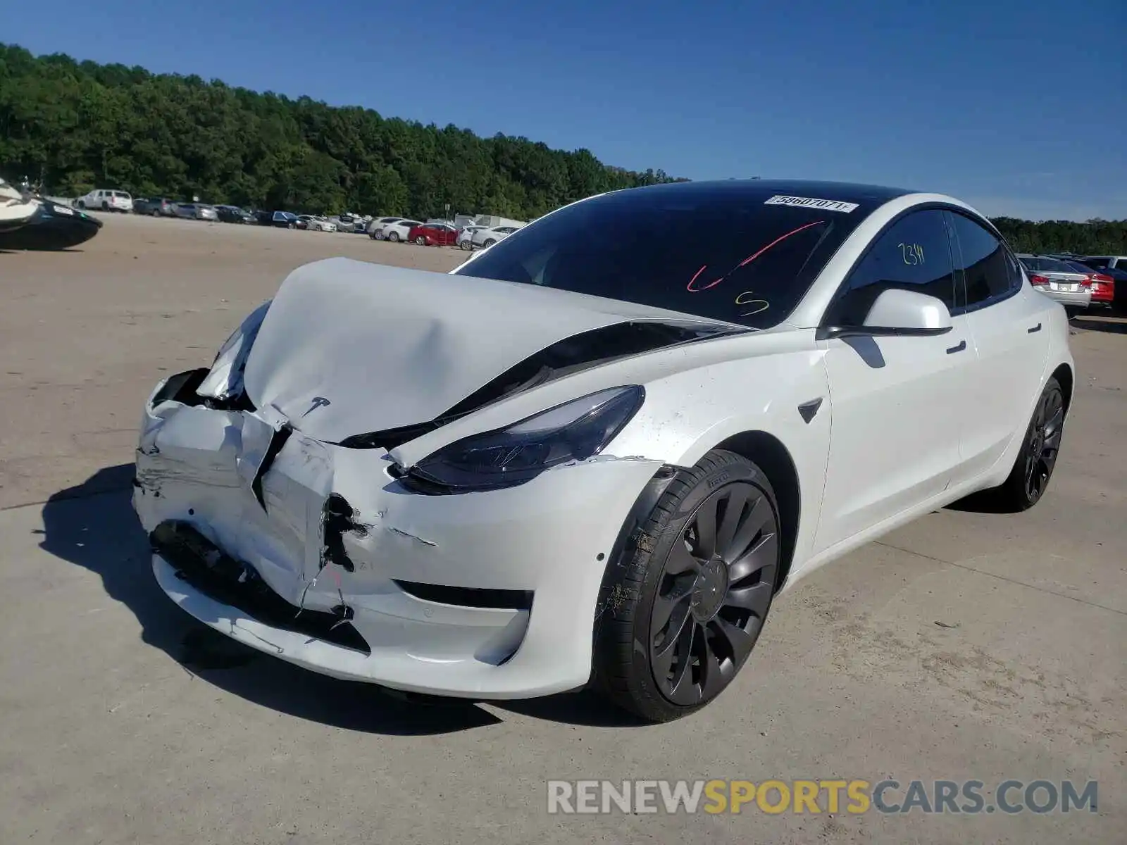 2 Photograph of a damaged car 5YJ3E1EC0MF037015 TESLA MODEL 3 2021