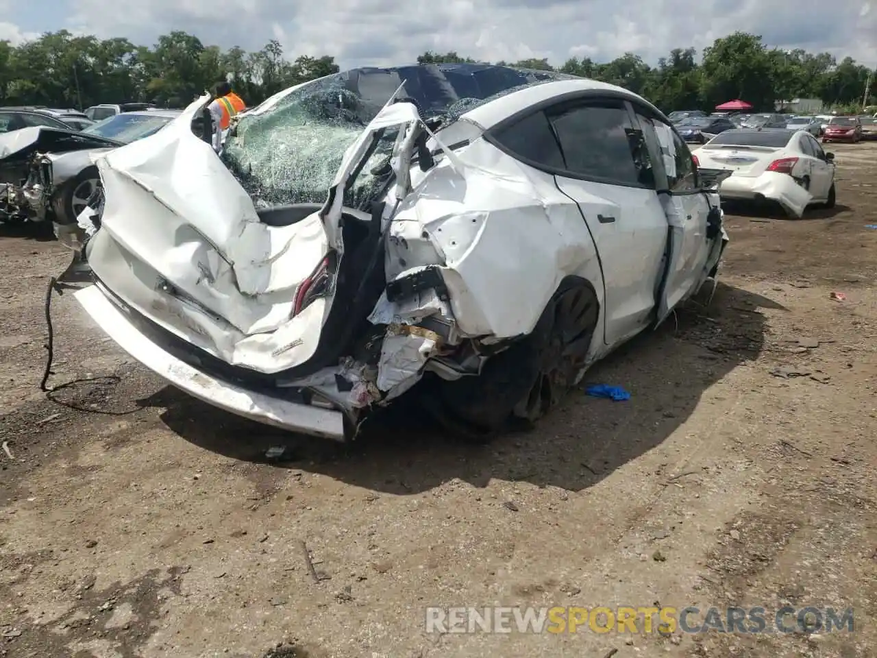 4 Photograph of a damaged car 5YJ3E1EC0MF913579 TESLA MODEL 3 2021