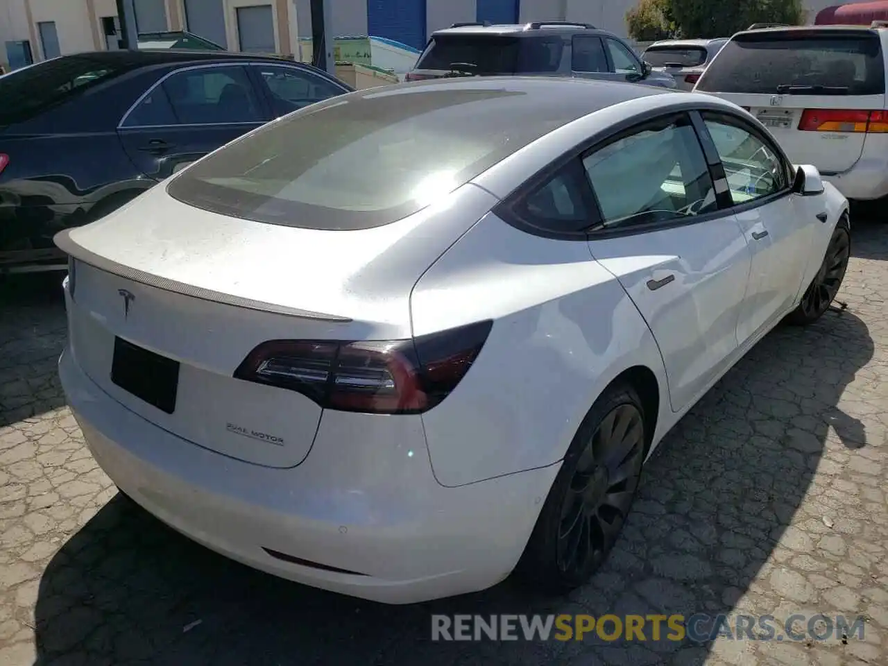 4 Photograph of a damaged car 5YJ3E1EC1MF000734 TESLA MODEL 3 2021