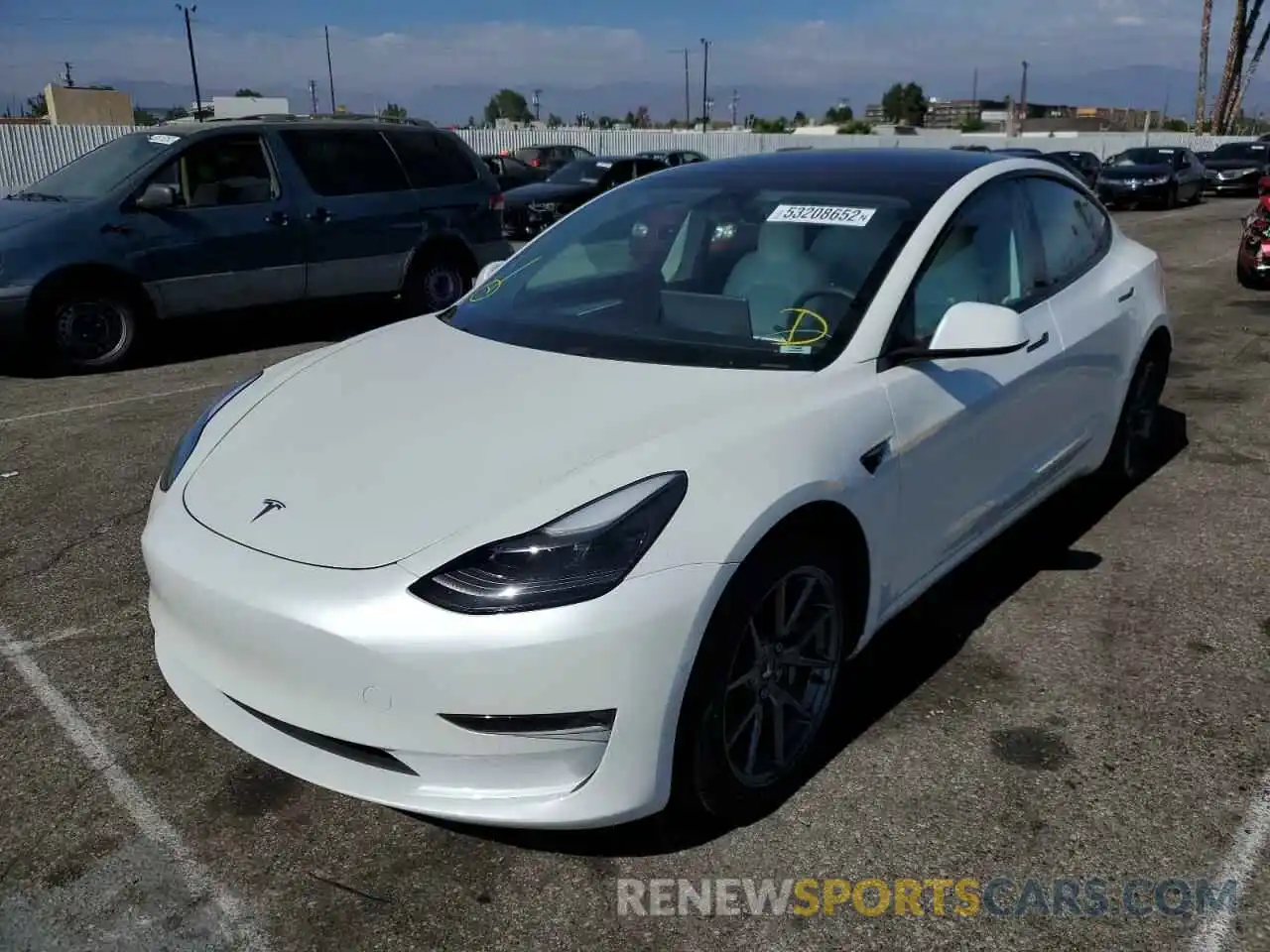 2 Photograph of a damaged car 5YJ3E1EC1MF077085 TESLA MODEL 3 2021