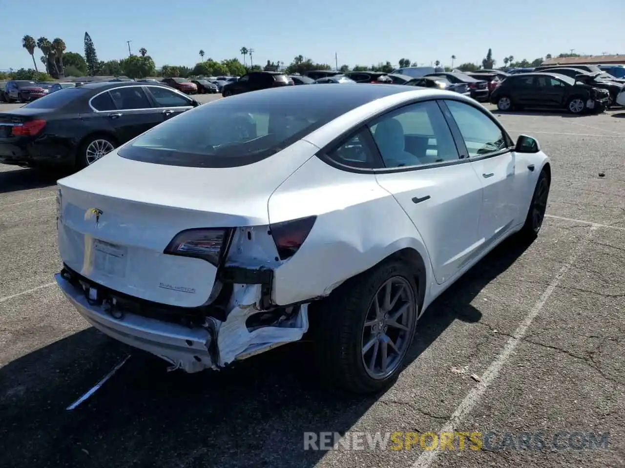 4 Photograph of a damaged car 5YJ3E1EC1MF077085 TESLA MODEL 3 2021