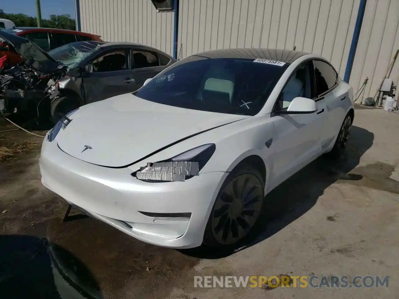 2 Photograph of a damaged car 5YJ3E1EC1MF082531 TESLA MODEL 3 2021