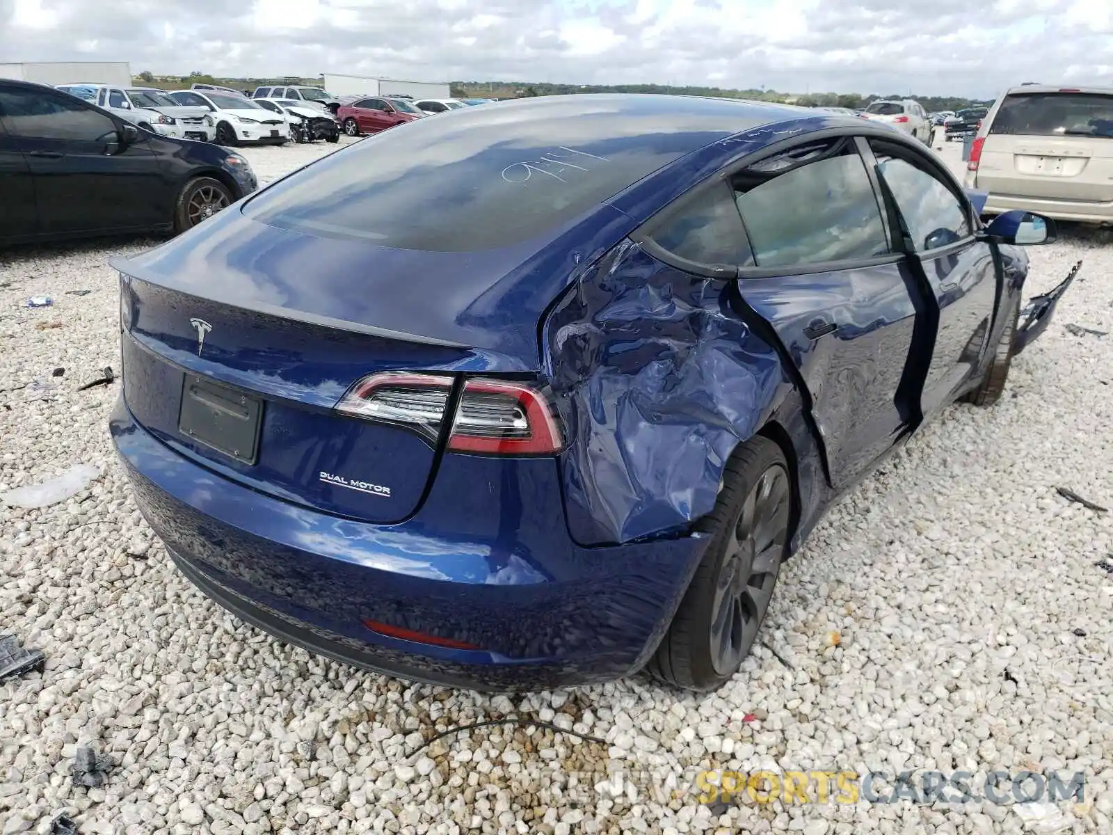 4 Photograph of a damaged car 5YJ3E1EC1MF926504 TESLA MODEL 3 2021