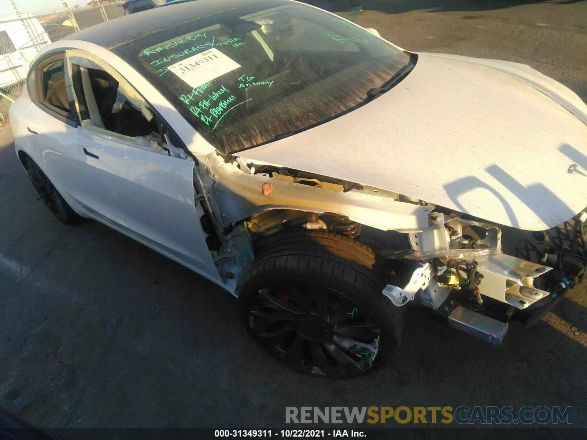 1 Photograph of a damaged car 5YJ3E1EC2MF015744 TESLA MODEL 3 2021