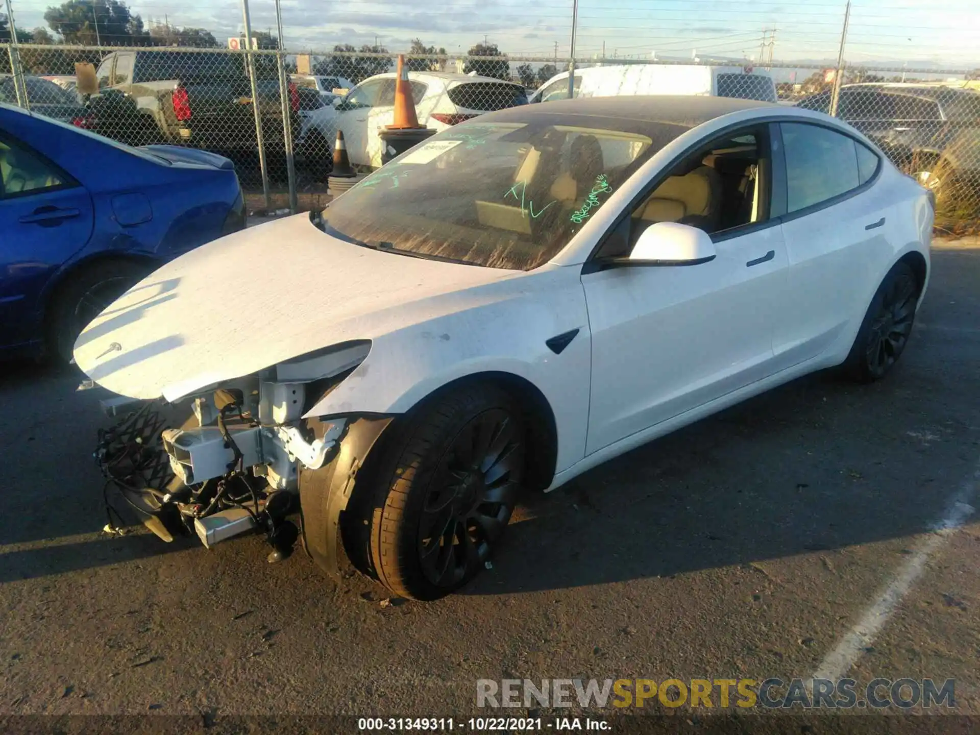 2 Photograph of a damaged car 5YJ3E1EC2MF015744 TESLA MODEL 3 2021