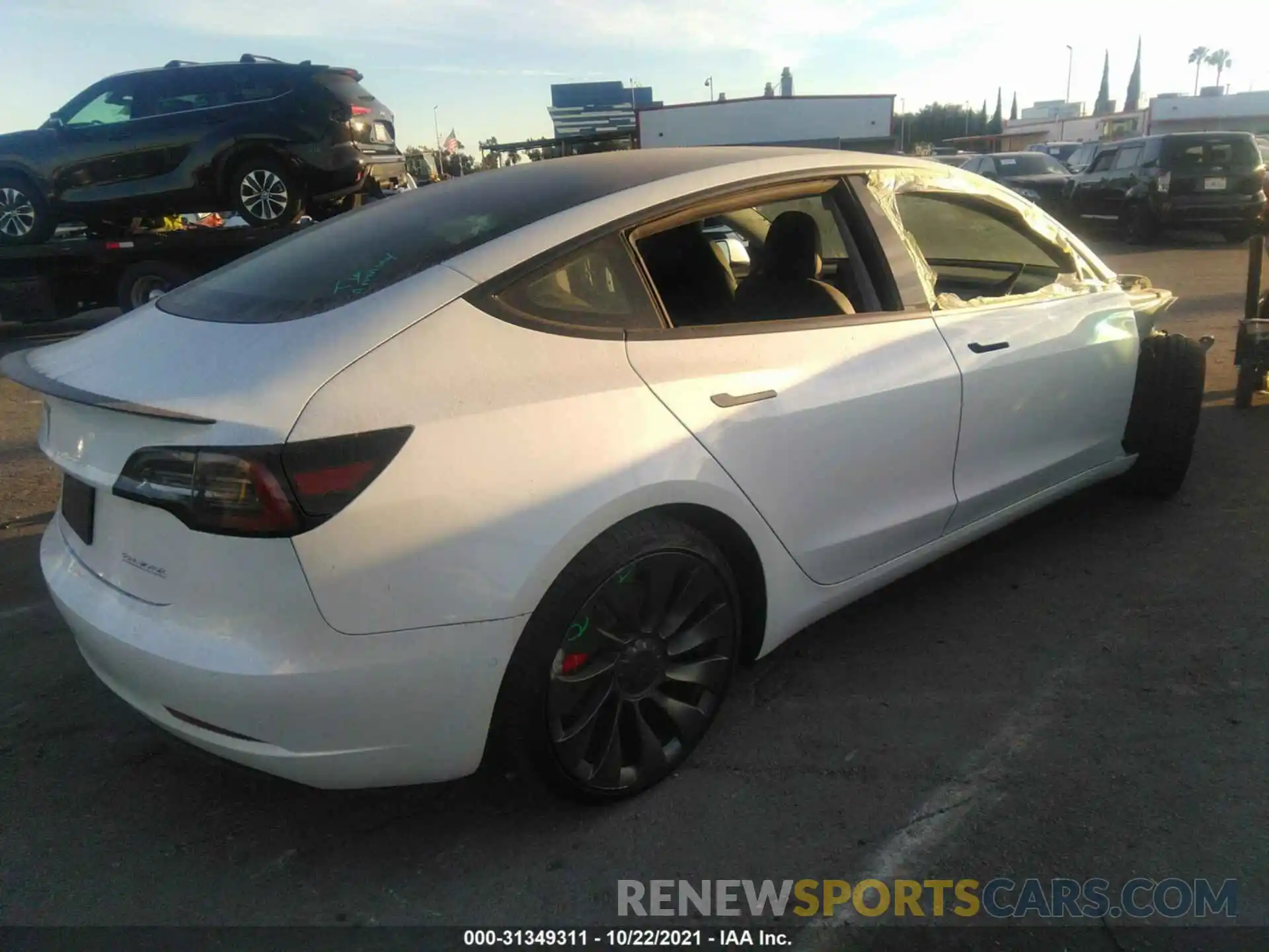 4 Photograph of a damaged car 5YJ3E1EC2MF015744 TESLA MODEL 3 2021