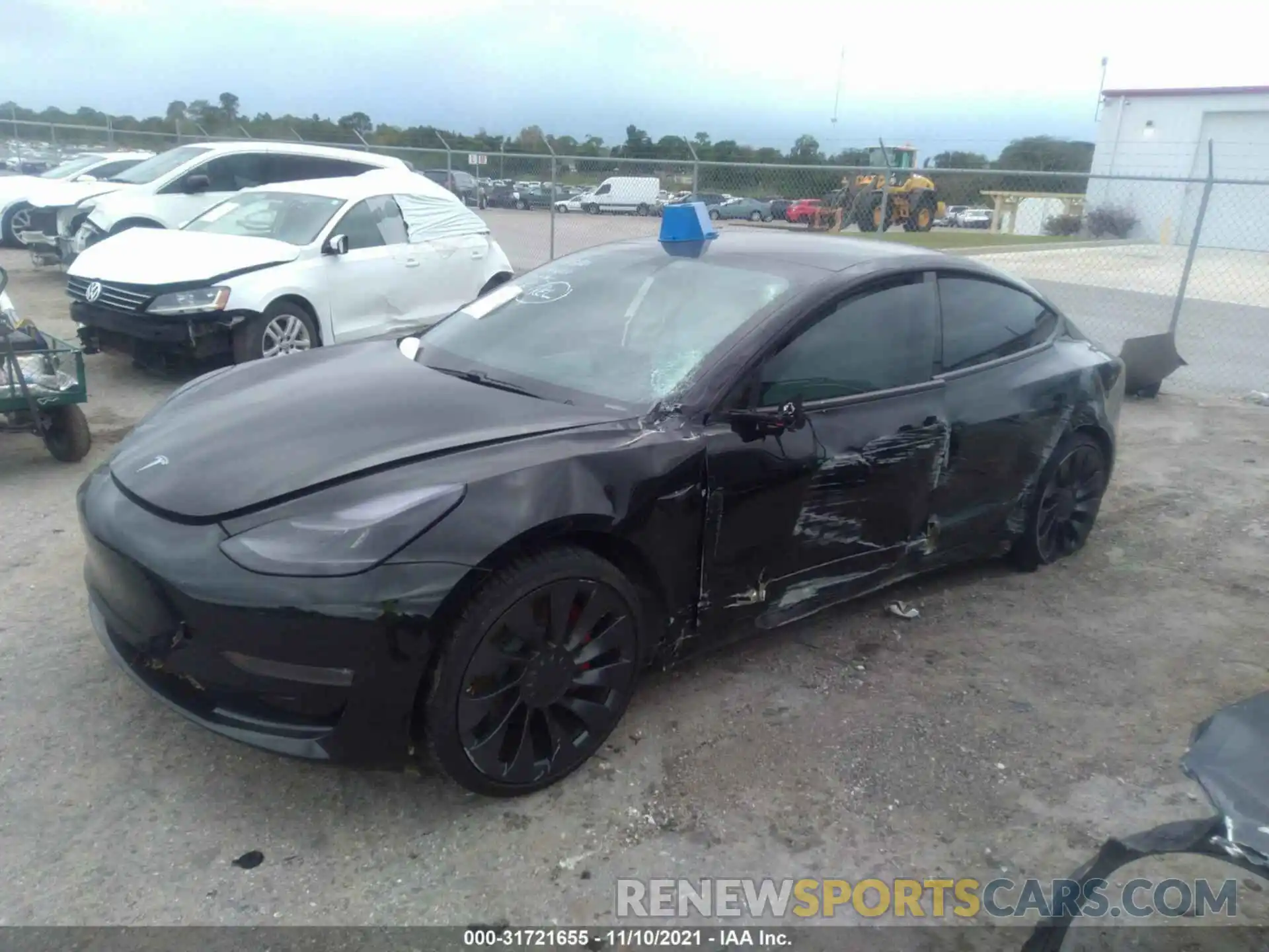 2 Photograph of a damaged car 5YJ3E1EC2MF913552 TESLA MODEL 3 2021