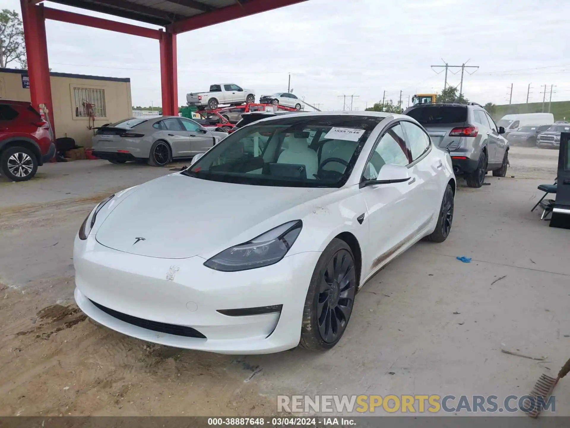 2 Photograph of a damaged car 5YJ3E1EC2MF913700 TESLA MODEL 3 2021