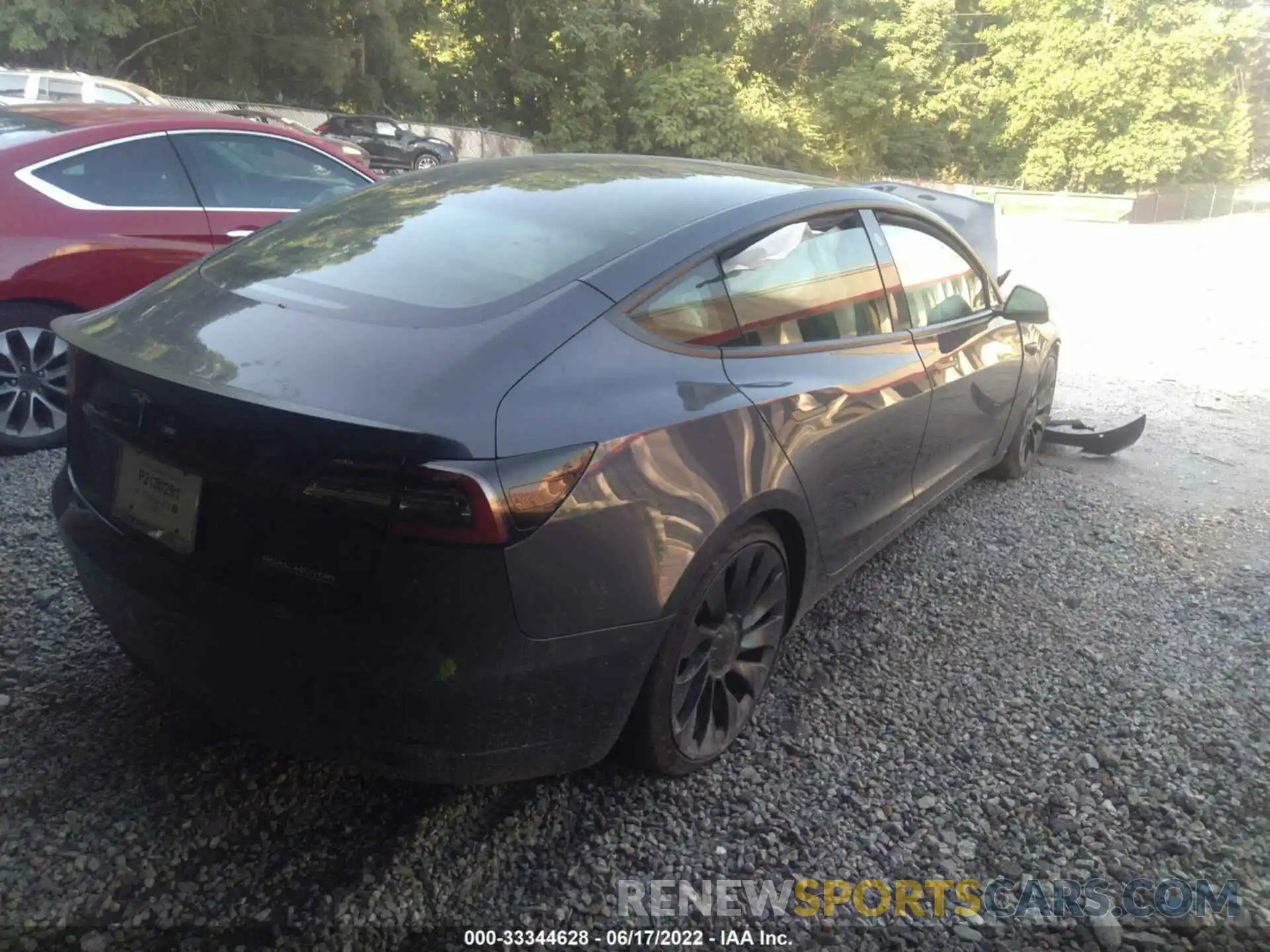 4 Photograph of a damaged car 5YJ3E1EC2MF925460 TESLA MODEL 3 2021