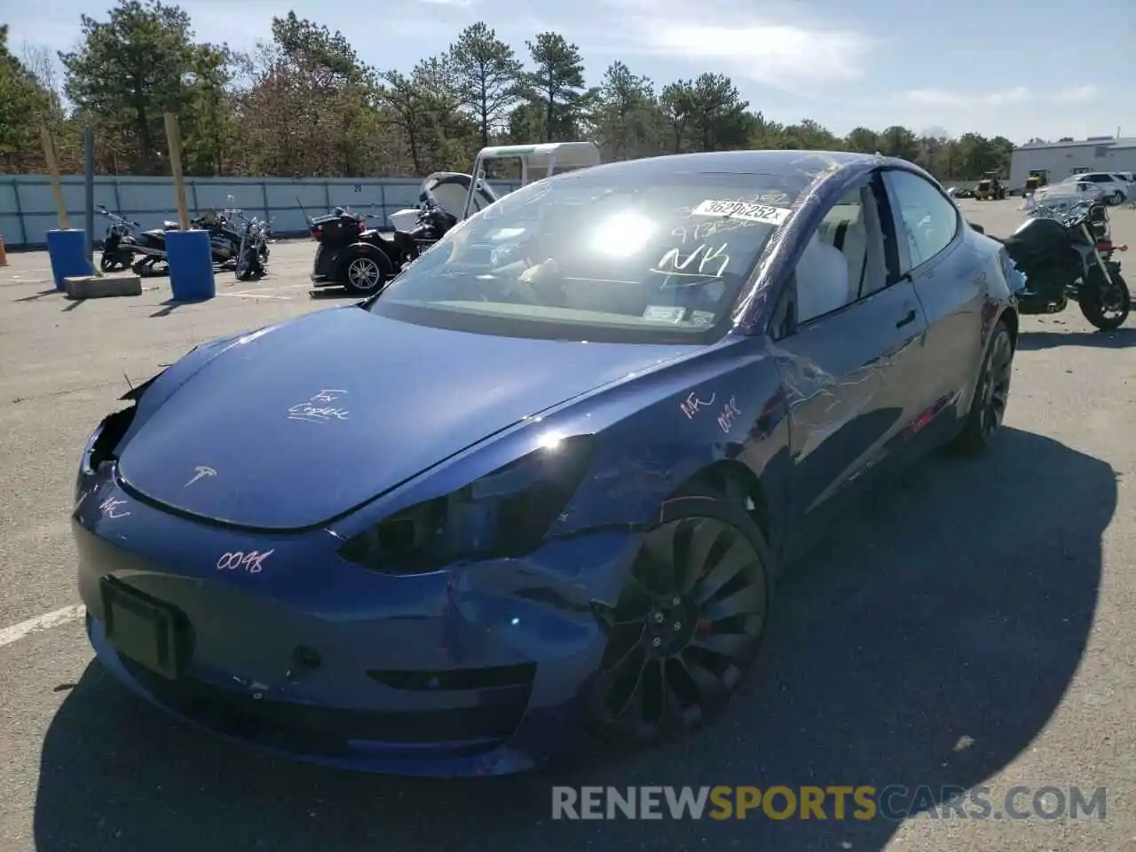 2 Photograph of a damaged car 5YJ3E1EC2MF973332 TESLA MODEL 3 2021