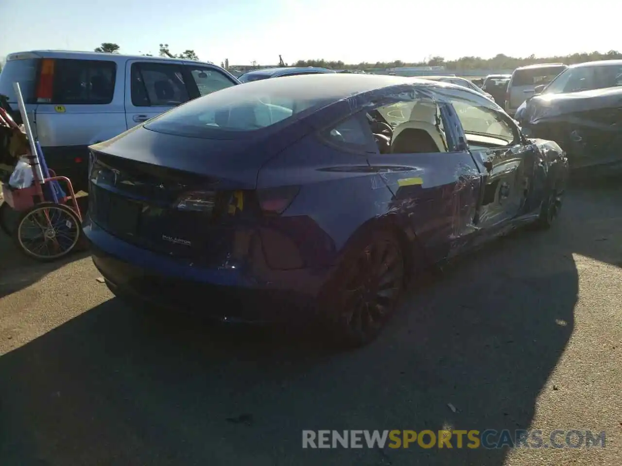 4 Photograph of a damaged car 5YJ3E1EC2MF973332 TESLA MODEL 3 2021