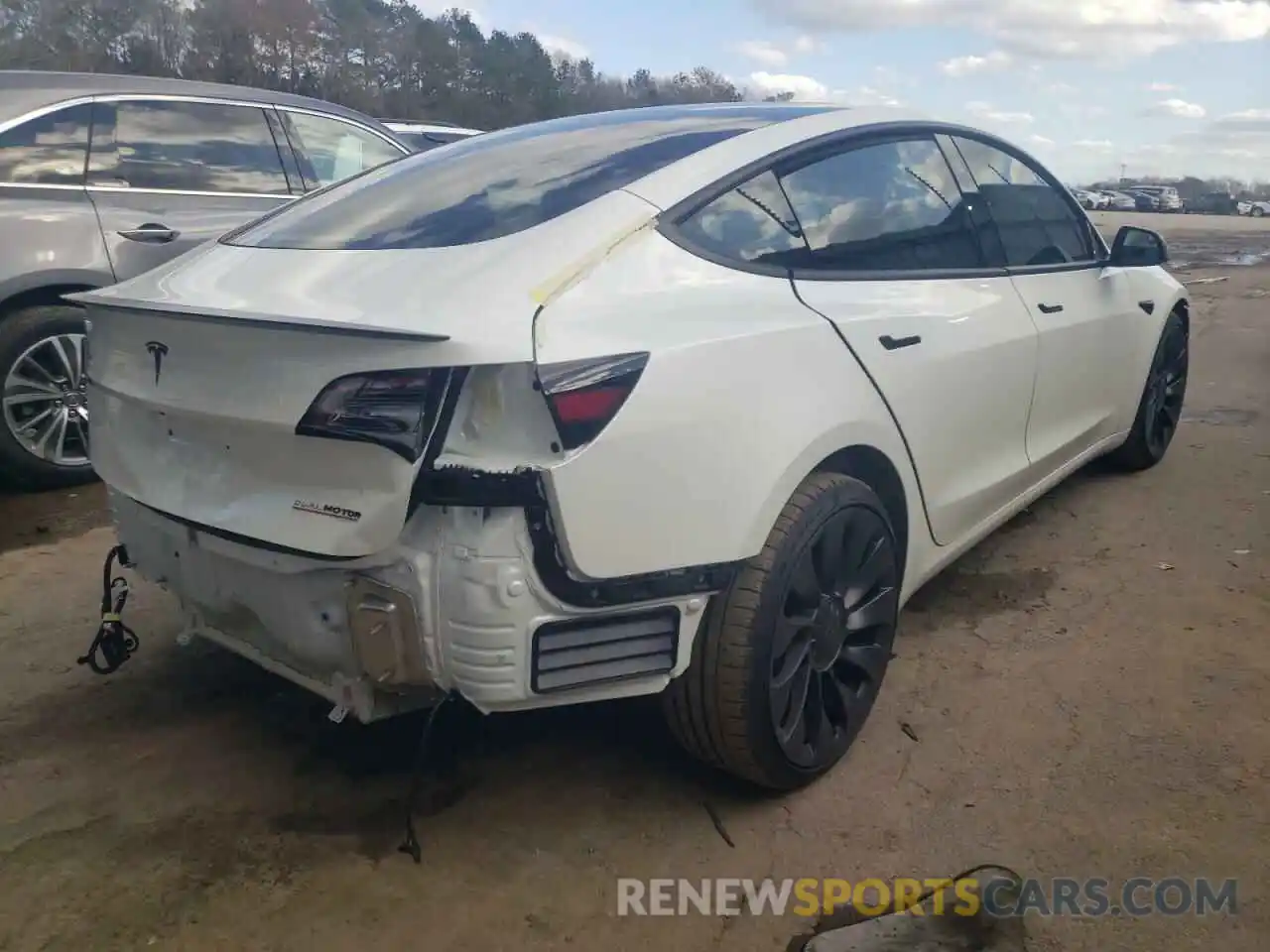 4 Photograph of a damaged car 5YJ3E1EC2MF980927 TESLA MODEL 3 2021