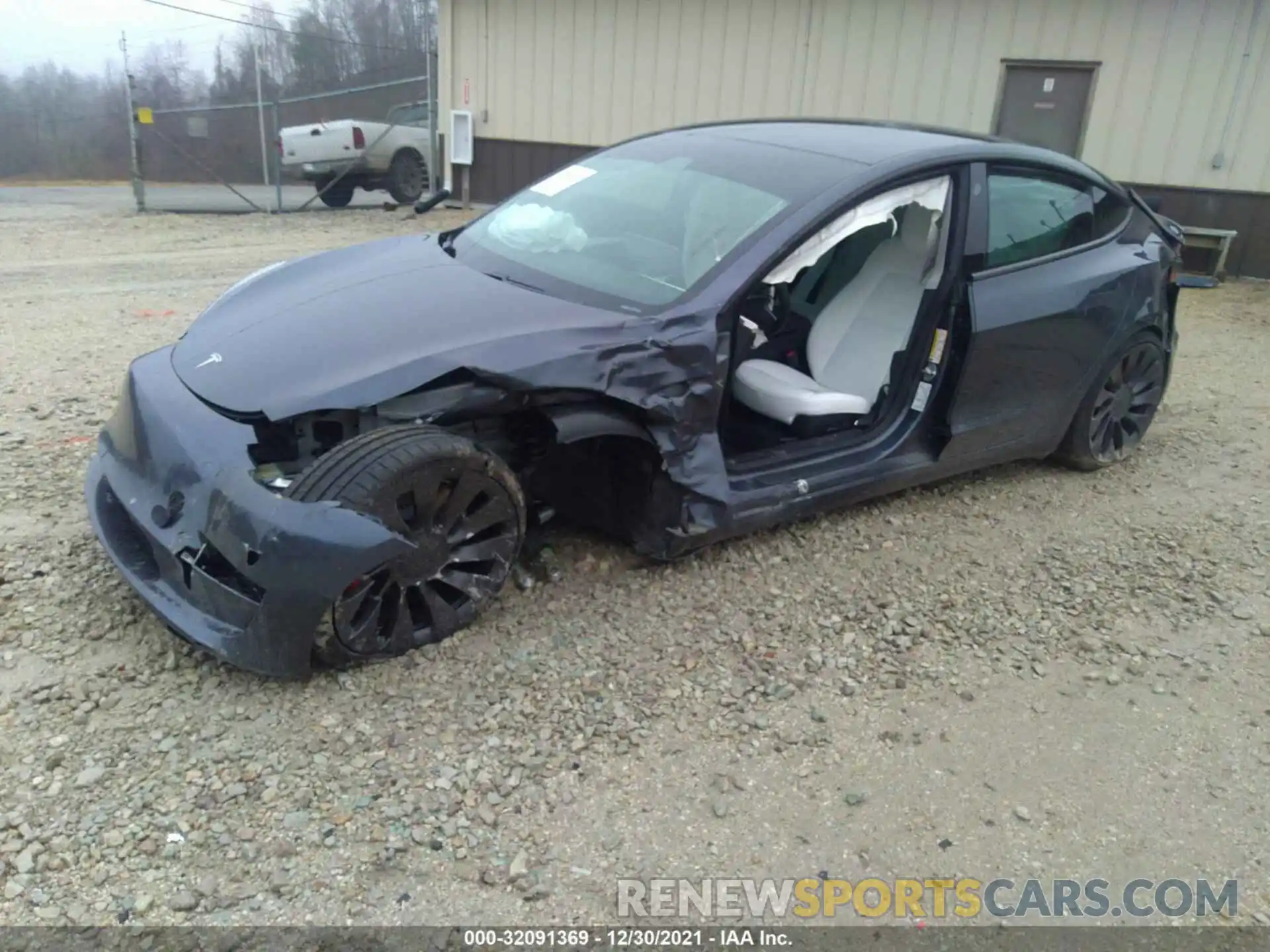 2 Photograph of a damaged car 5YJ3E1EC3MF087696 TESLA MODEL 3 2021