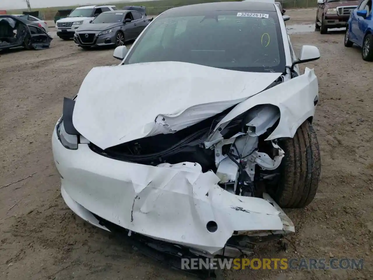 9 Photograph of a damaged car 5YJ3E1EC3MF094258 TESLA MODEL 3 2021