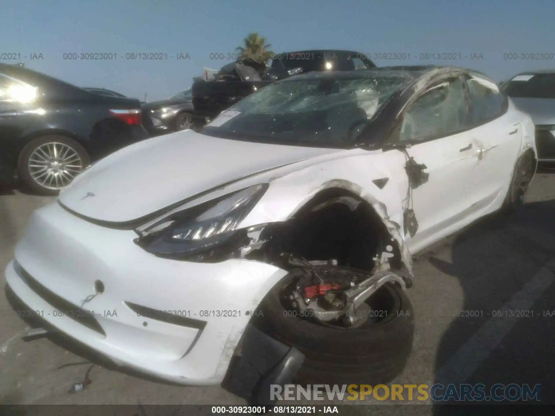 2 Photograph of a damaged car 5YJ3E1EC3MF849795 TESLA MODEL 3 2021