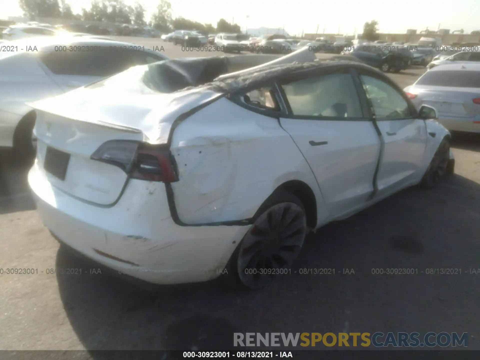 4 Photograph of a damaged car 5YJ3E1EC3MF849795 TESLA MODEL 3 2021