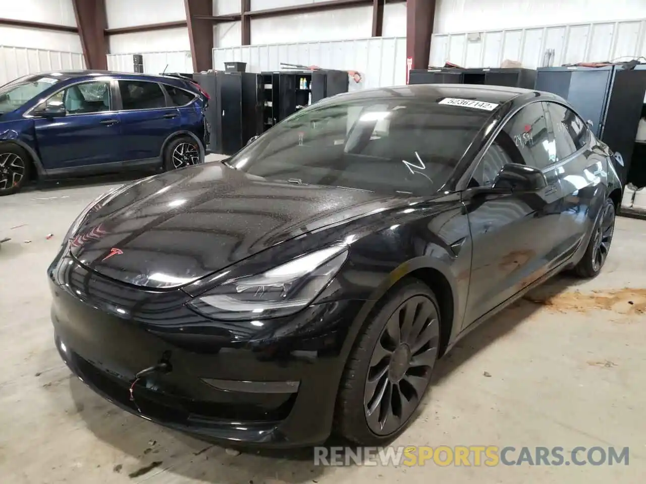 2 Photograph of a damaged car 5YJ3E1EC3MF913611 TESLA MODEL 3 2021