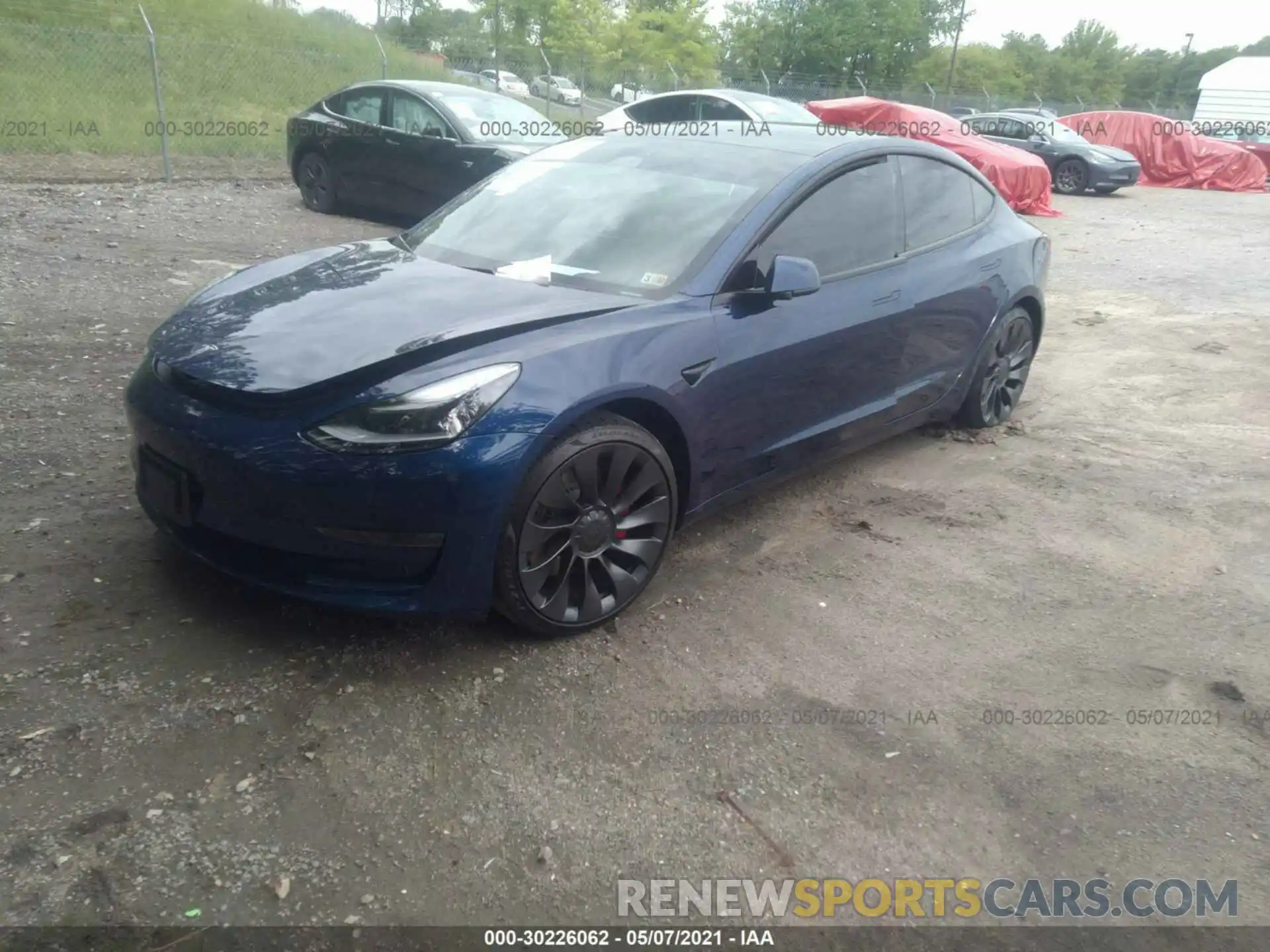 2 Photograph of a damaged car 5YJ3E1EC3MF914631 TESLA MODEL 3 2021