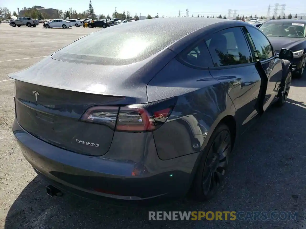 4 Photograph of a damaged car 5YJ3E1EC3MF926097 TESLA MODEL 3 2021