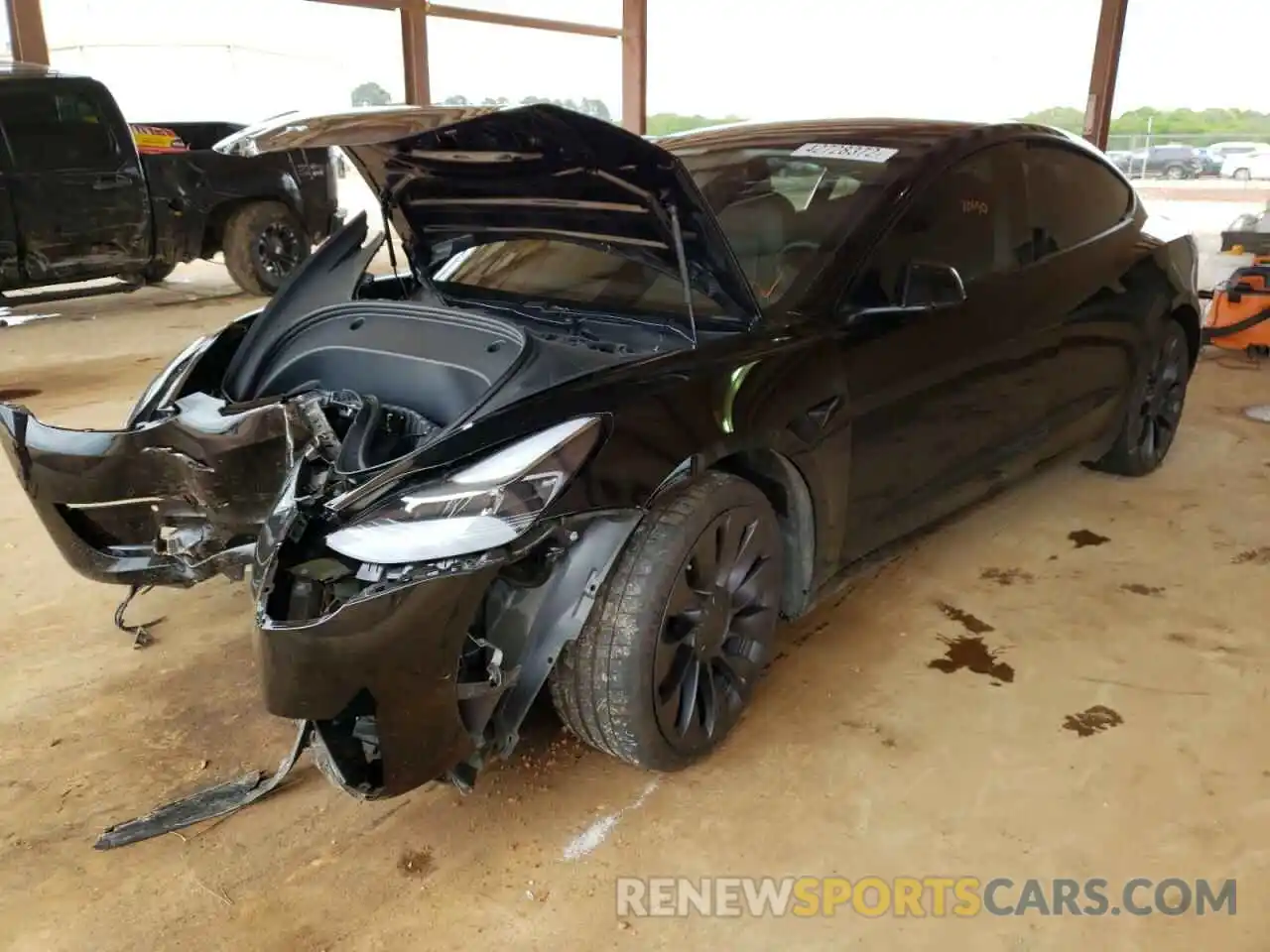 2 Photograph of a damaged car 5YJ3E1EC3MF976031 TESLA MODEL 3 2021