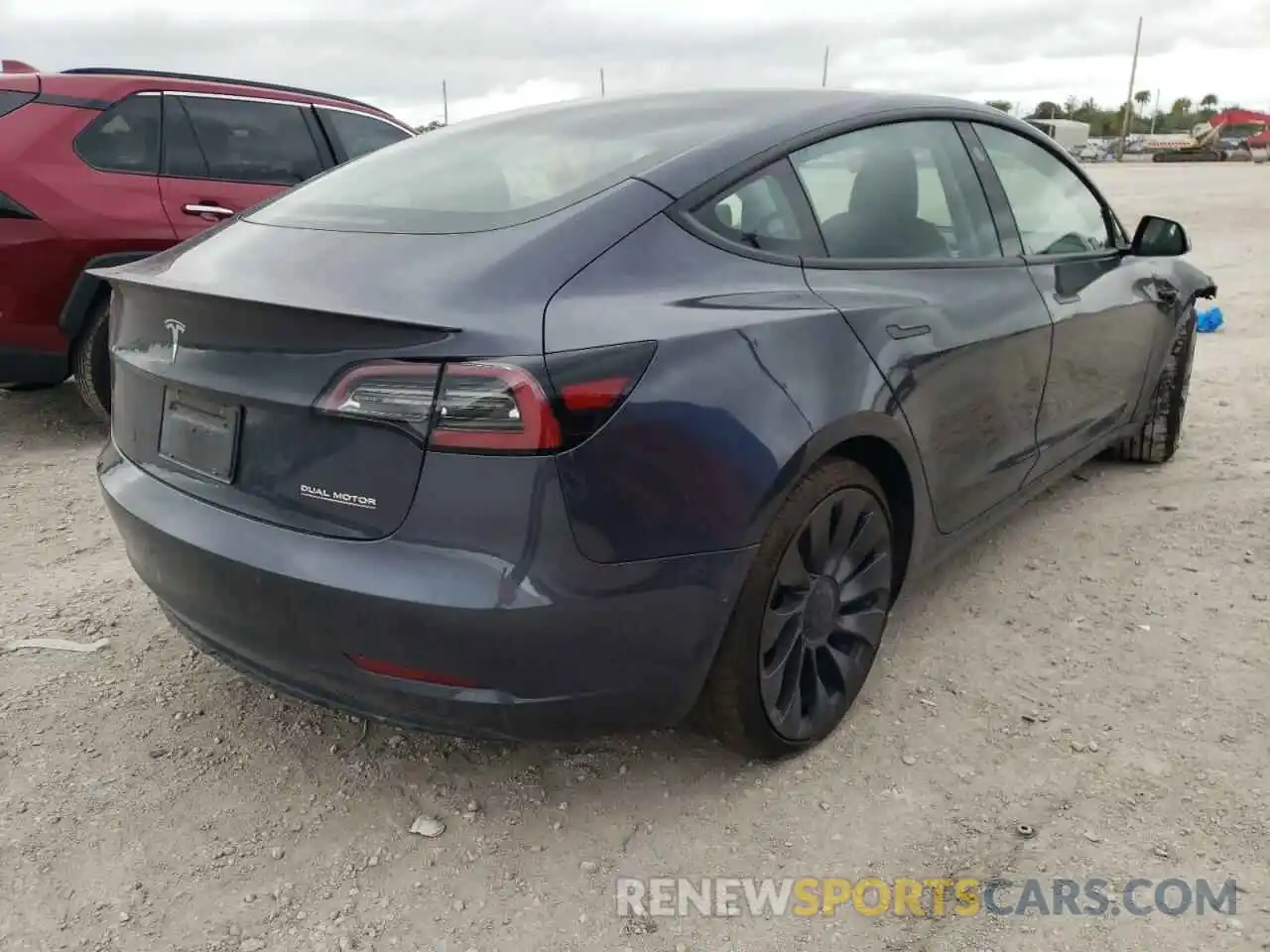 4 Photograph of a damaged car 5YJ3E1EC4MF030181 TESLA MODEL 3 2021