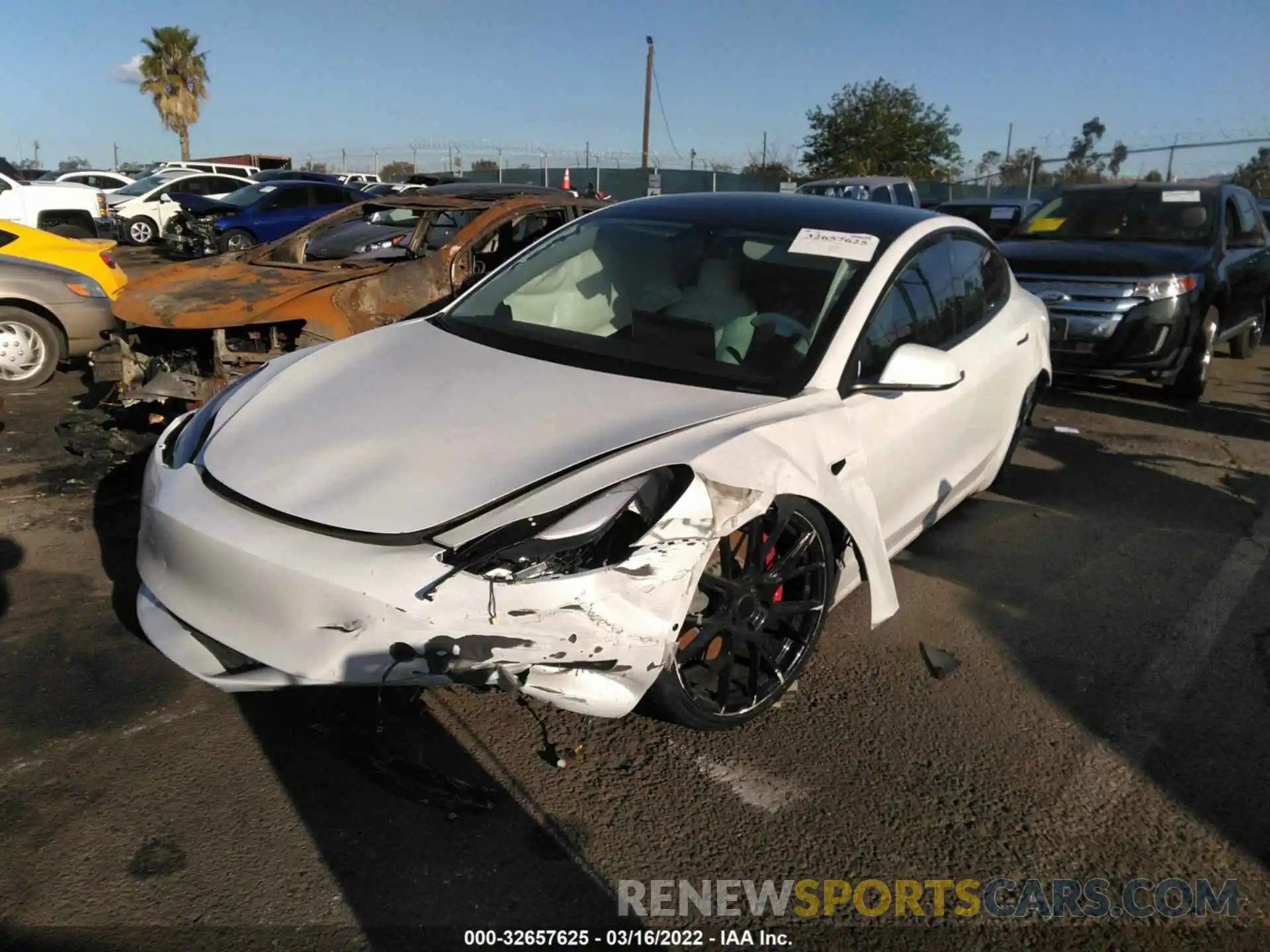 2 Photograph of a damaged car 5YJ3E1EC4MF030827 TESLA MODEL 3 2021