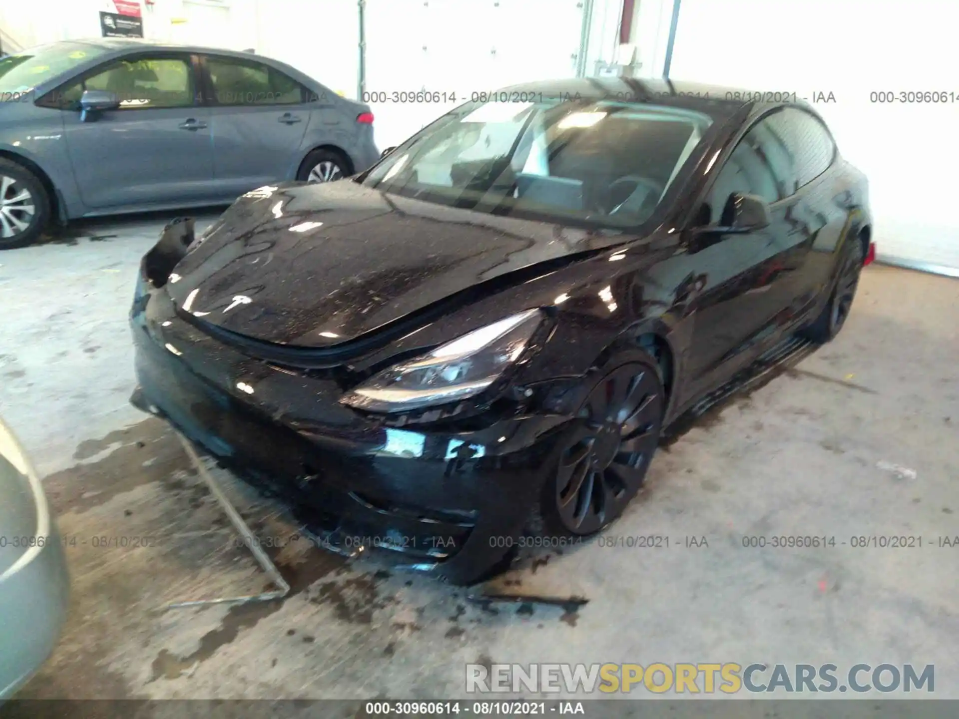 2 Photograph of a damaged car 5YJ3E1EC4MF984722 TESLA MODEL 3 2021