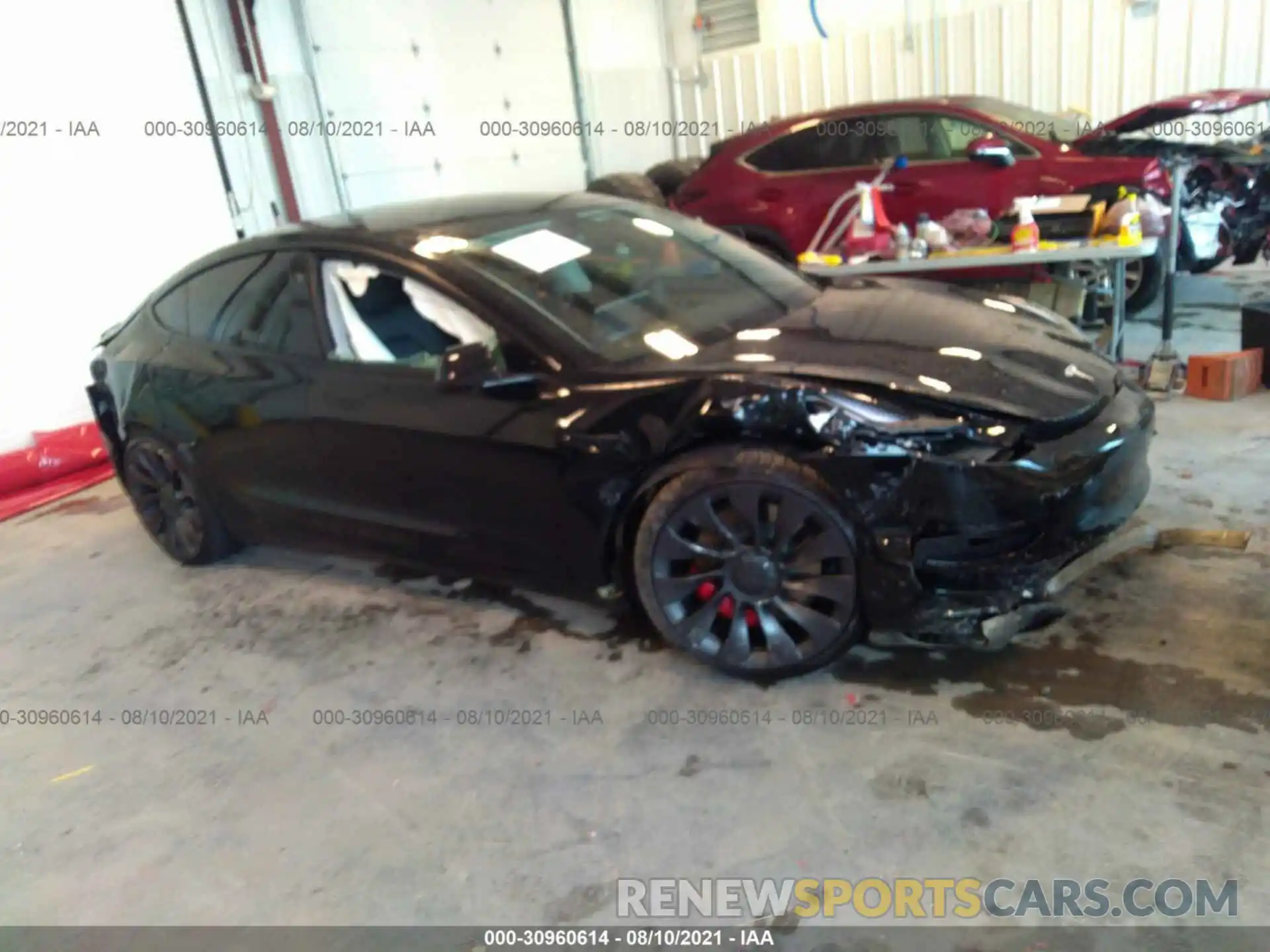 6 Photograph of a damaged car 5YJ3E1EC4MF984722 TESLA MODEL 3 2021