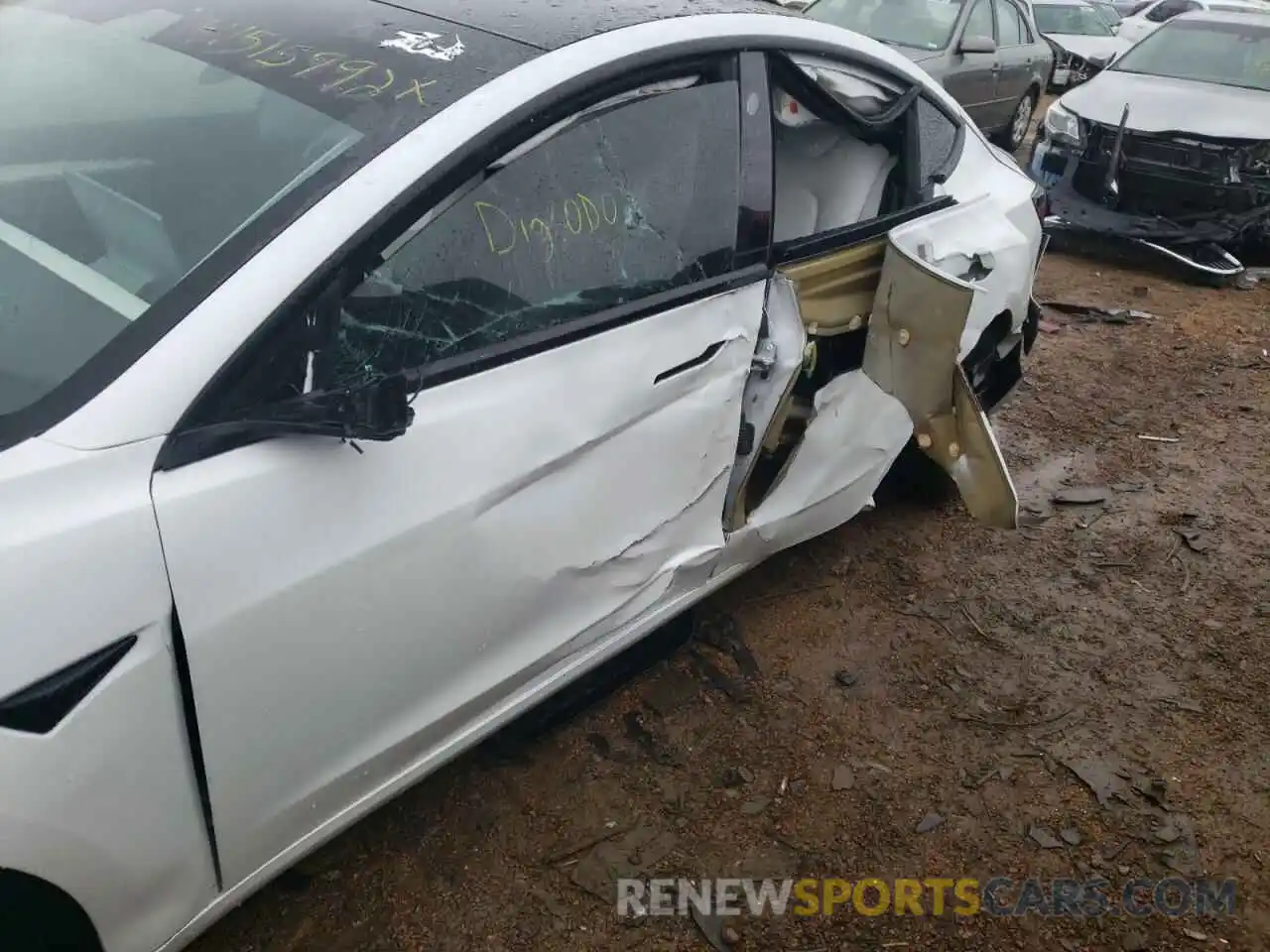 9 Photograph of a damaged car 5YJ3E1EC5MF044638 TESLA MODEL 3 2021