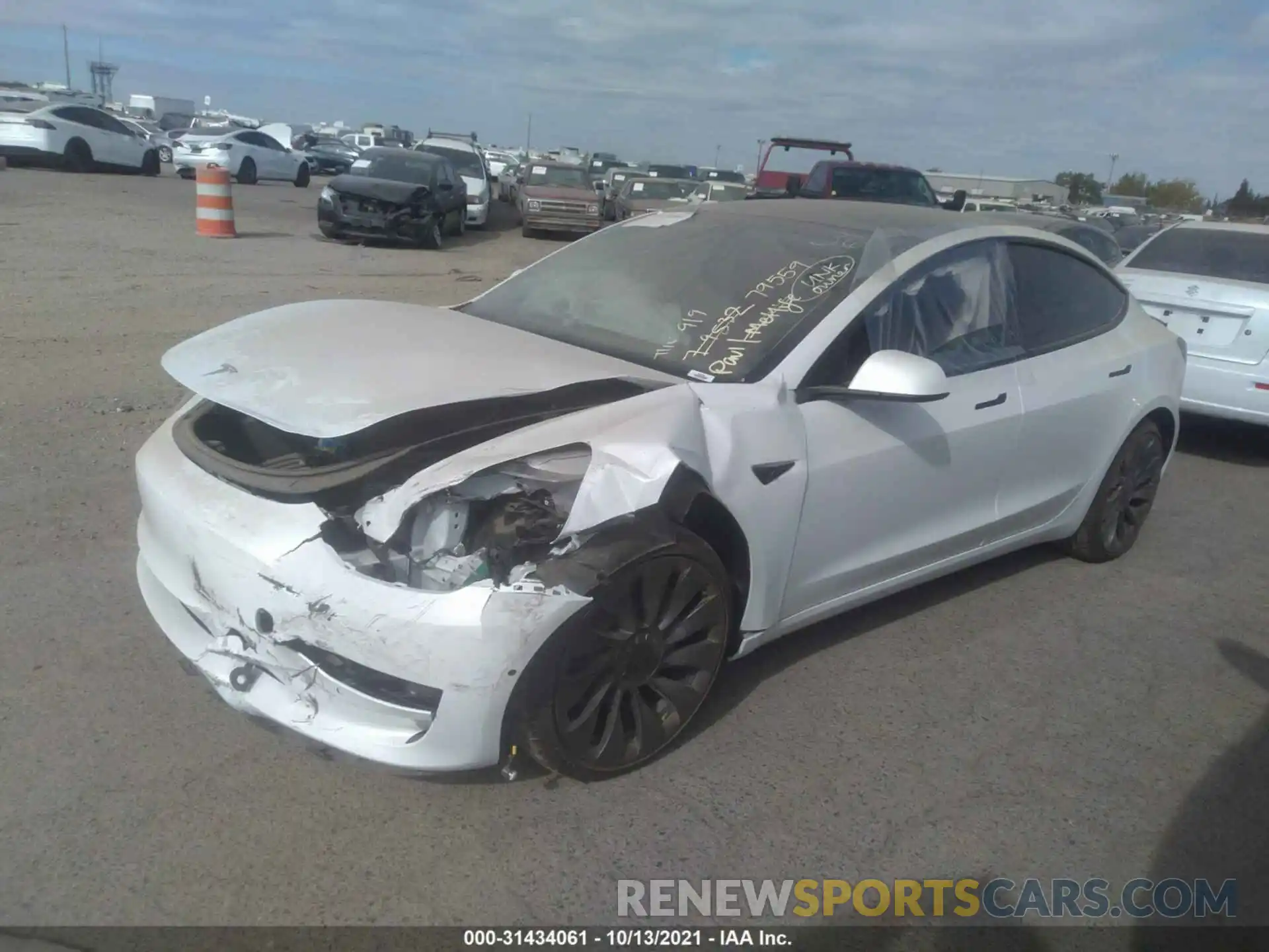 2 Photograph of a damaged car 5YJ3E1EC6MF024298 TESLA MODEL 3 2021