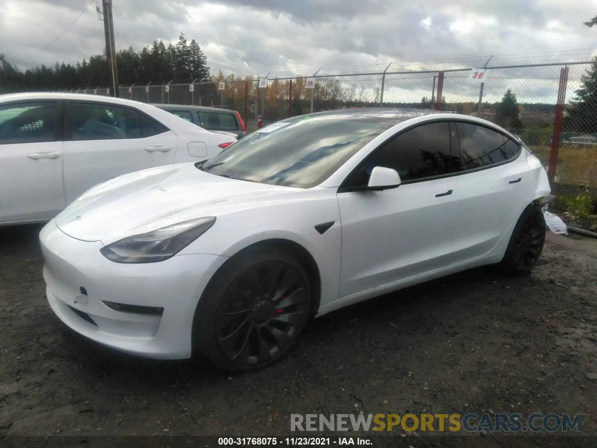 2 Photograph of a damaged car 5YJ3E1EC6MF926028 TESLA MODEL 3 2021